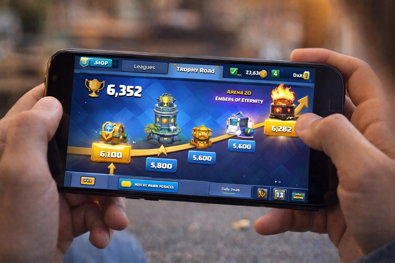Smartphone zeigt den Fortschrittsbereich eines Mobile Games mit Trophäen, Rangstufen und Belohnungen, ein Beispiel für den endlosen Fortschrittspfad in Spielen wie Clash Royale, der Spieler langfristig bindet.