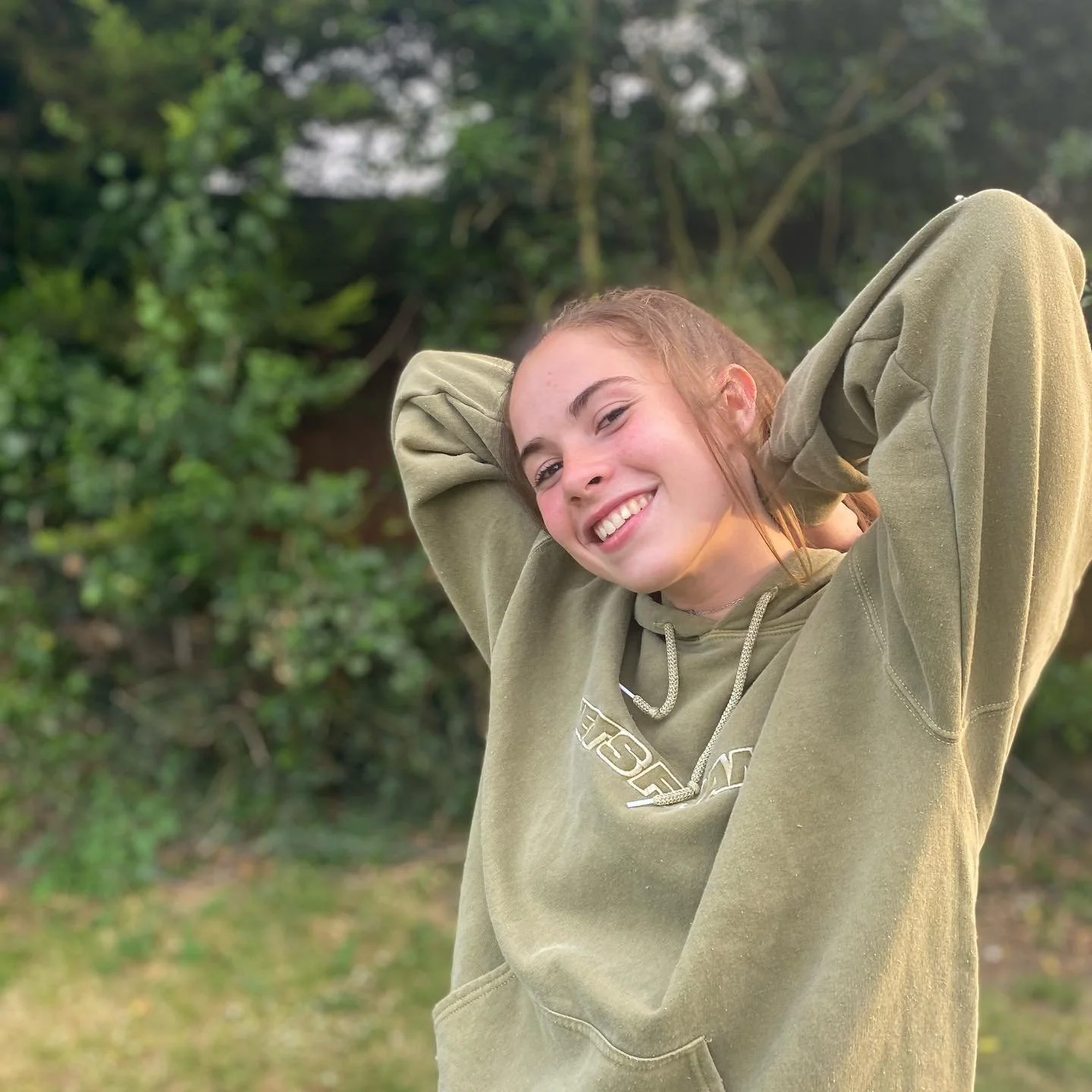green hoodie shrug