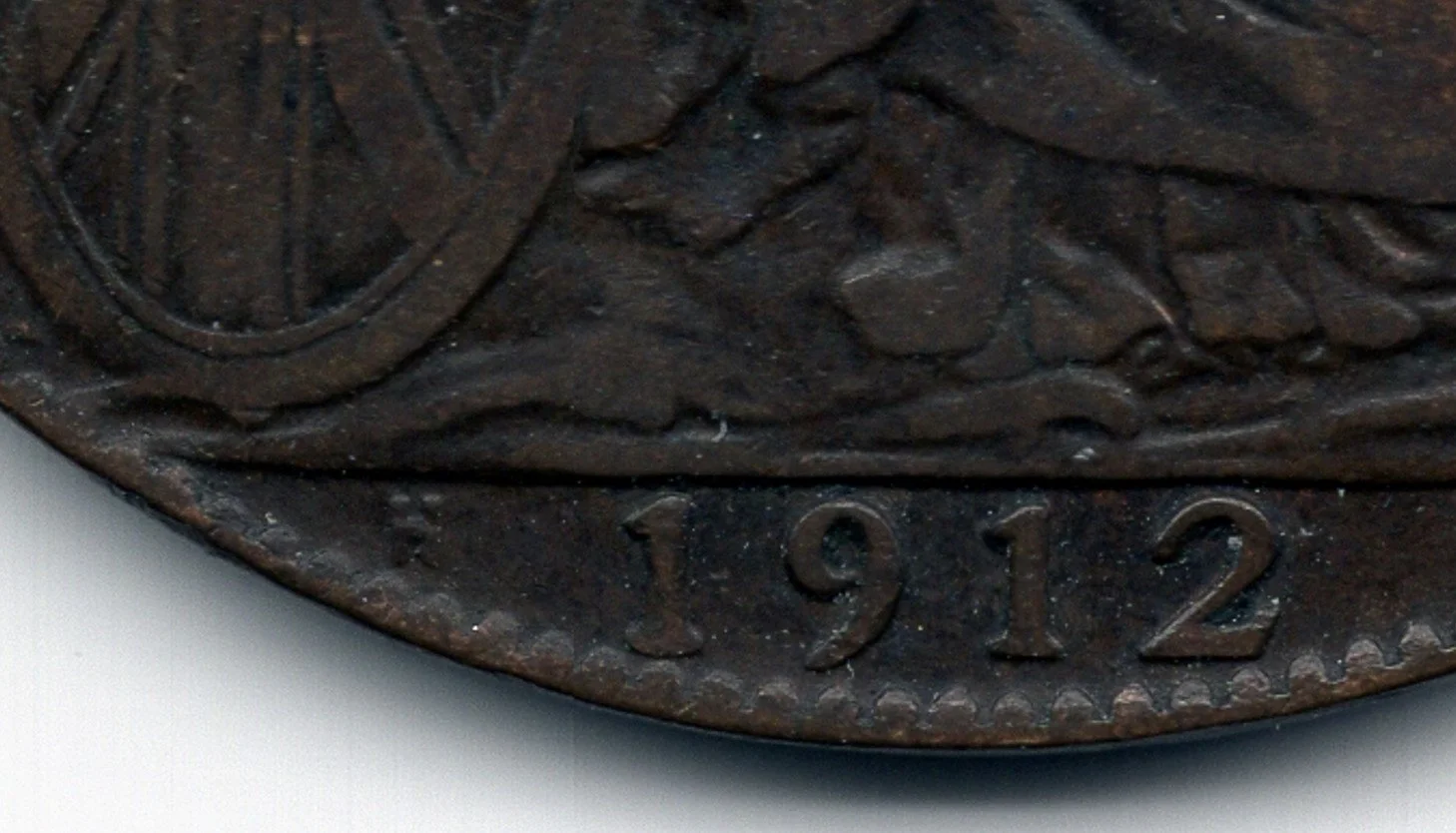 Close up of a penny with a Heaton mint mark 1912