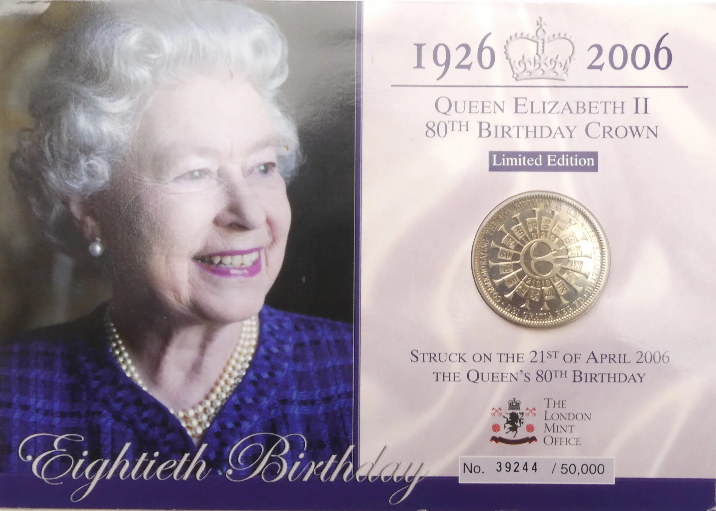 Card containing 1986 Queen Elizabeth II 80th Birthday Crown front