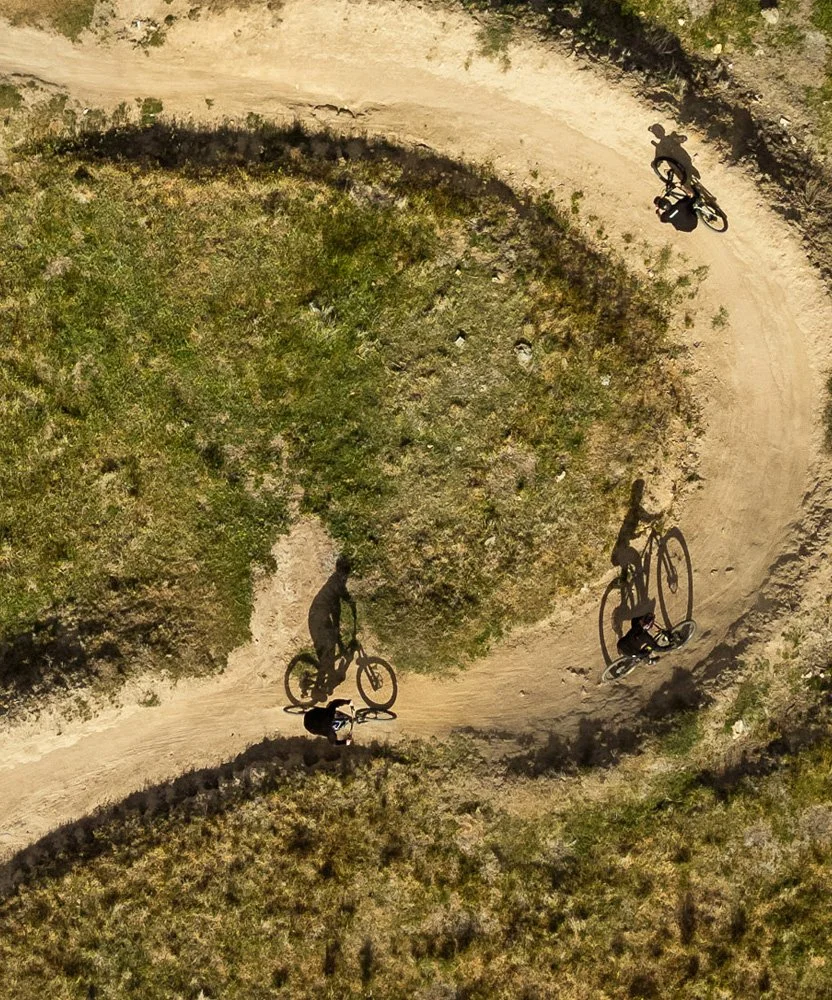 Student mountain biking on a Snowy Mountains trail during a Venture Outdoors Co. program.