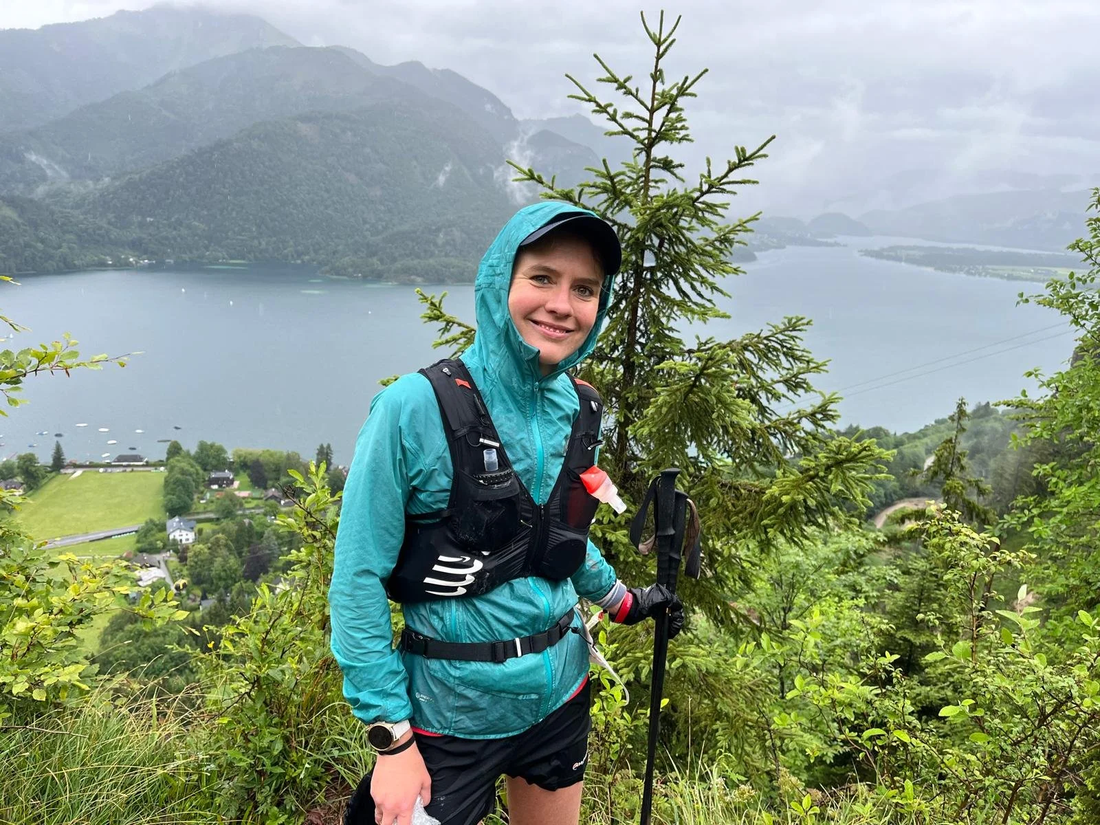 A hand holding a glass award with a black and gold design. The award features a large gold medal with the number 1 on it, surrounded by a laurel wreath. Below, a plaque reads 'Norfork 100km 2023 1st Female'.
