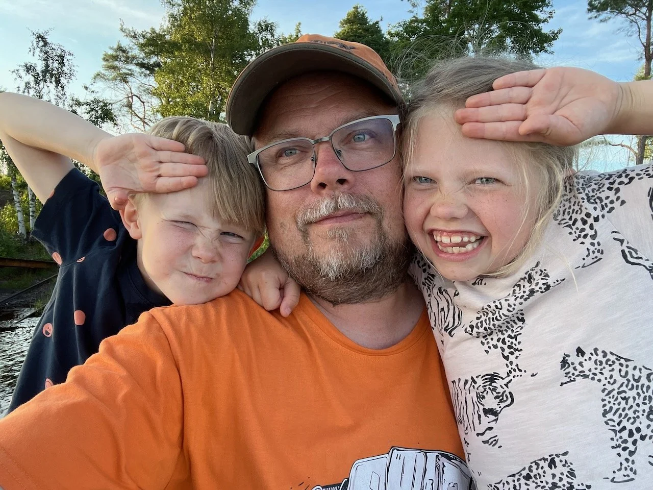 A picture of Marcus and his adorable children