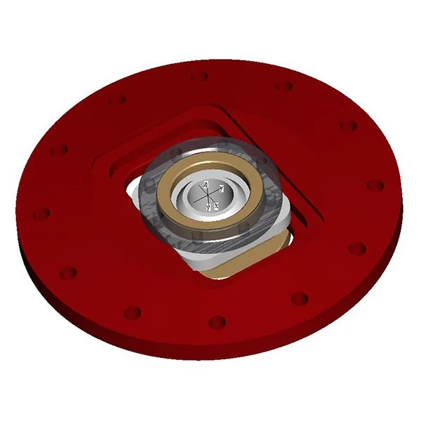Technisches Bauteil mit rot-weißem Gehäuse und Lager.