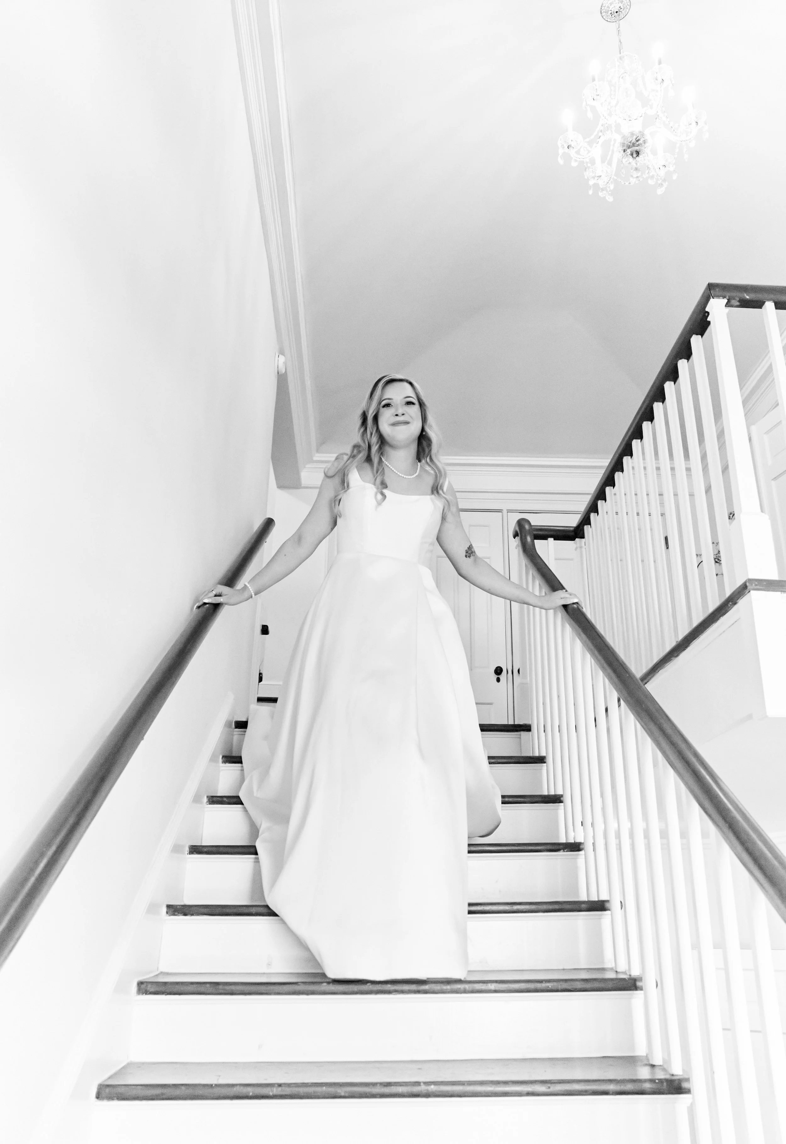 bride_candid_walking_down_stairs_black_and_white_gk_photography.jpg