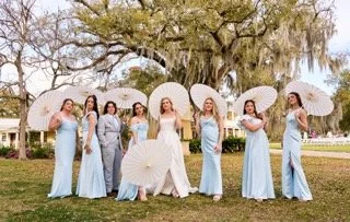 bride_and_bridesmaids_holding_parasols_gk_photography Small.jpeg