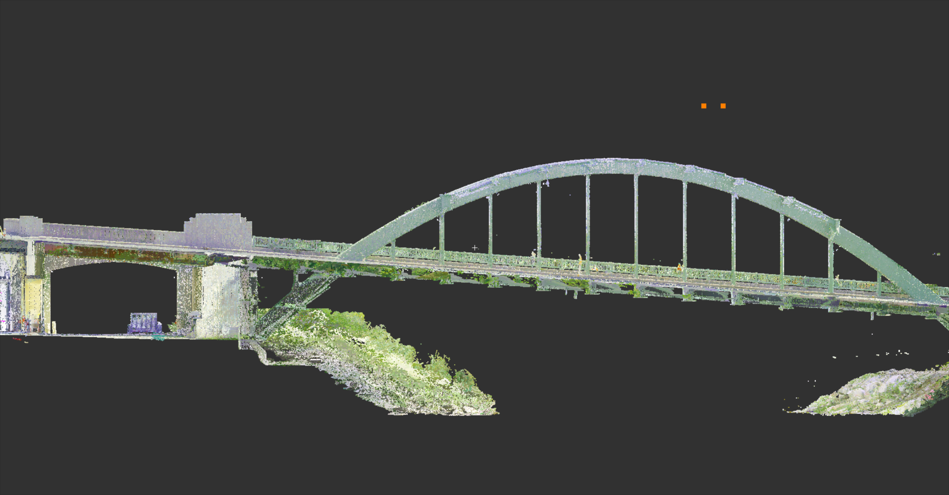 A bridge with an arch and supports, spanning over a body of water with a green, hilly shoreline visible underneath.