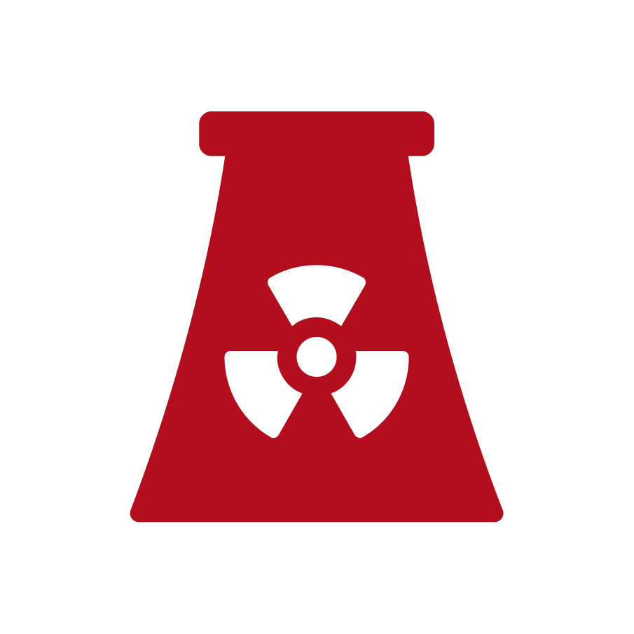 Red industrial cooling tower with a black radioactive warning symbol on it.