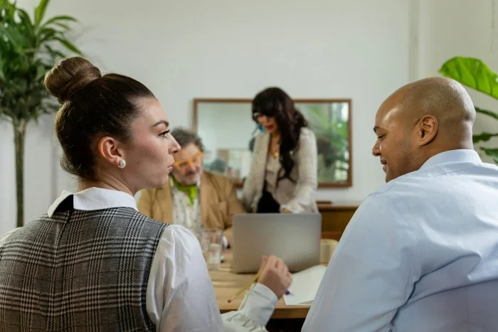 A corporate team having a meeting.