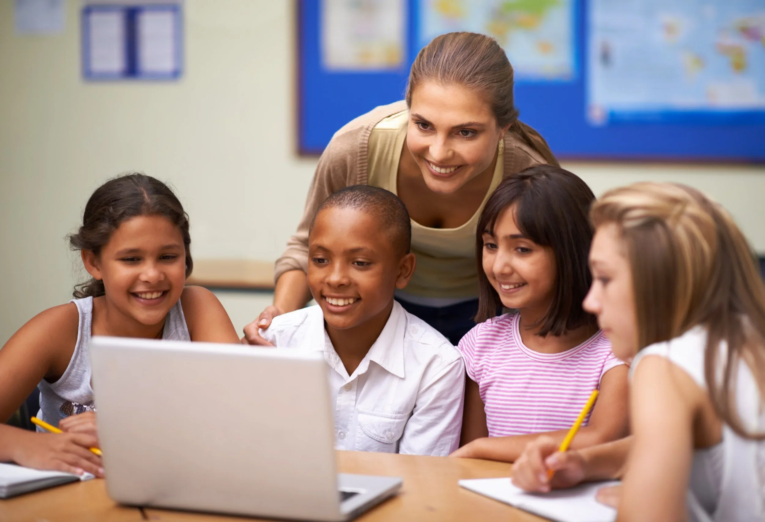 Teacher teching elementary school children