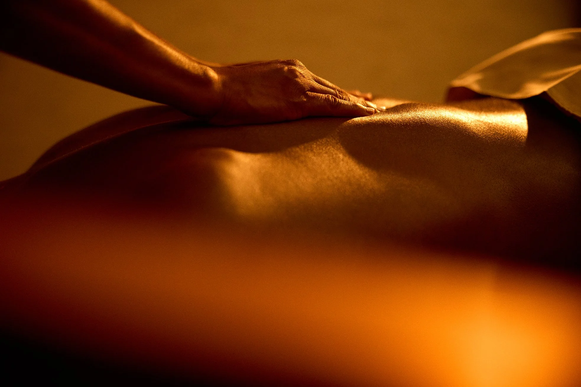 Close up detail of back receiving massage