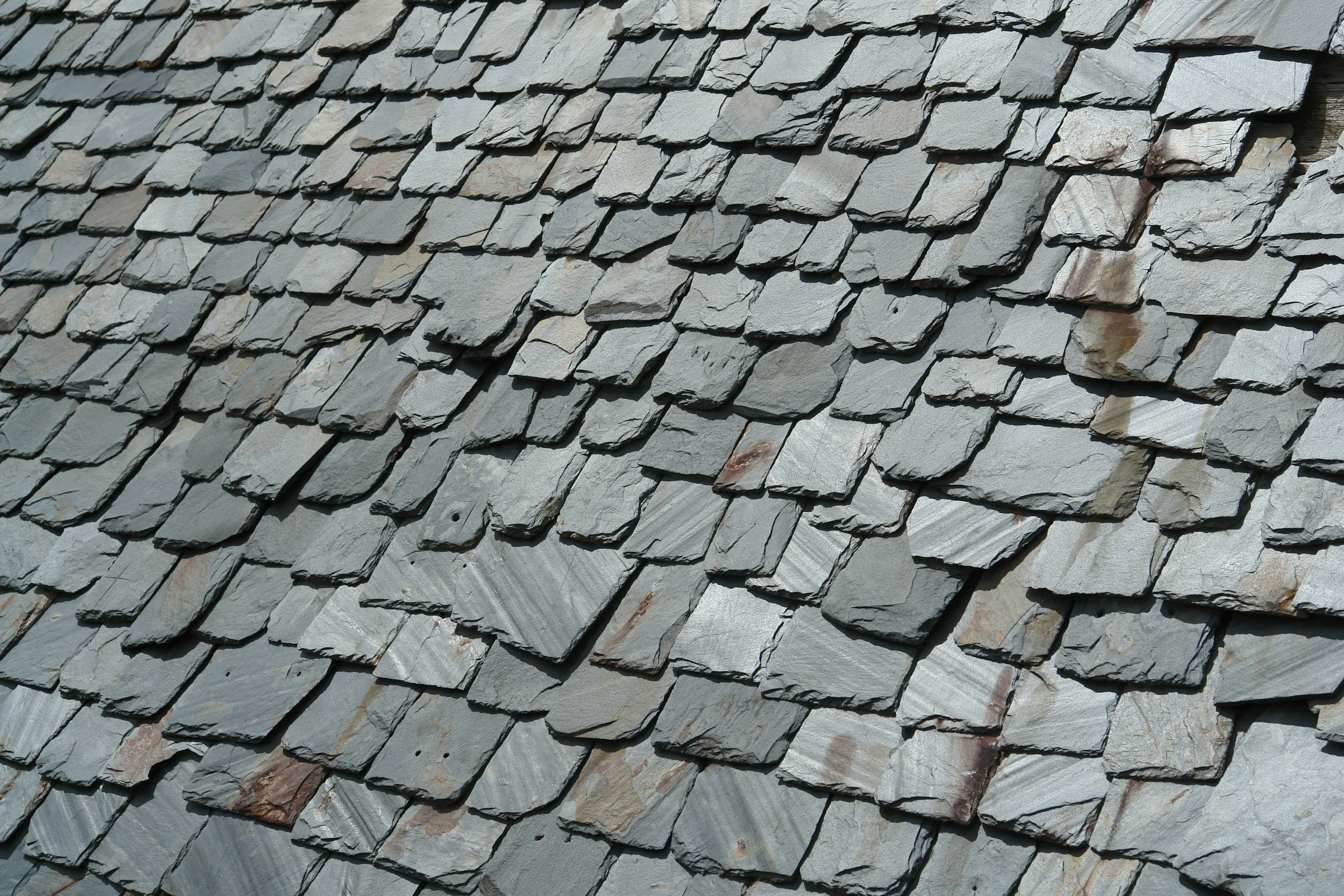 Weathered slate roof viewed during a roofing survey