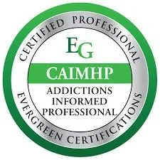 A circular badge with a green and white color scheme. It reads 'Certified Professional' around the top, 'Addictions Informed Professional' around the bottom, 'Eg' and 'CAMP' in the center, with 'CAIMHP' below, indicating certification in addiction counseling.