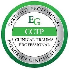 Seal with green border and black text indicating certification as a clinical trauma professional and evergreen certifications.