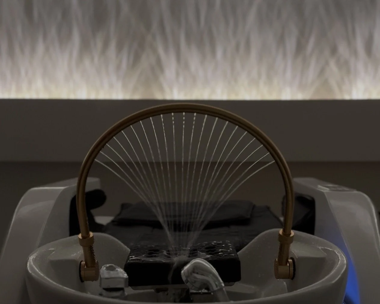 Guest enjoying a scalp massage head spa treatment at The Head Ritual