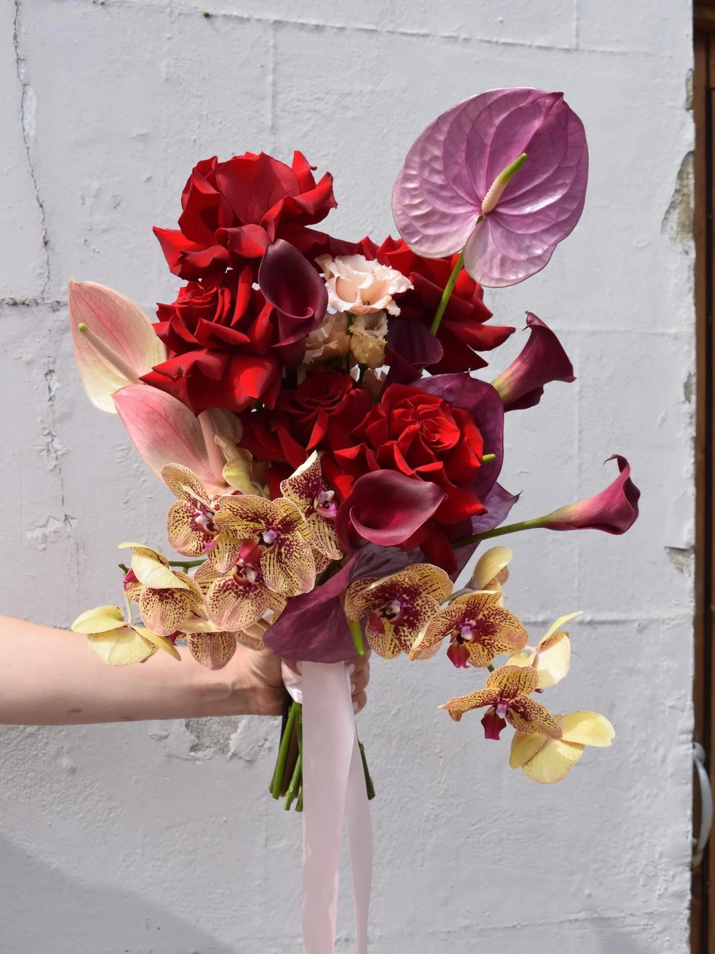 lucky red, gold &amp; purple for lovely poppy at the chelsea physic garden yesterday ✨ that gold orchid is sooo divine ❤️

London wedding florists | 2027 bride | modern floral design | Sussex wedding flowers | bold wedding florals