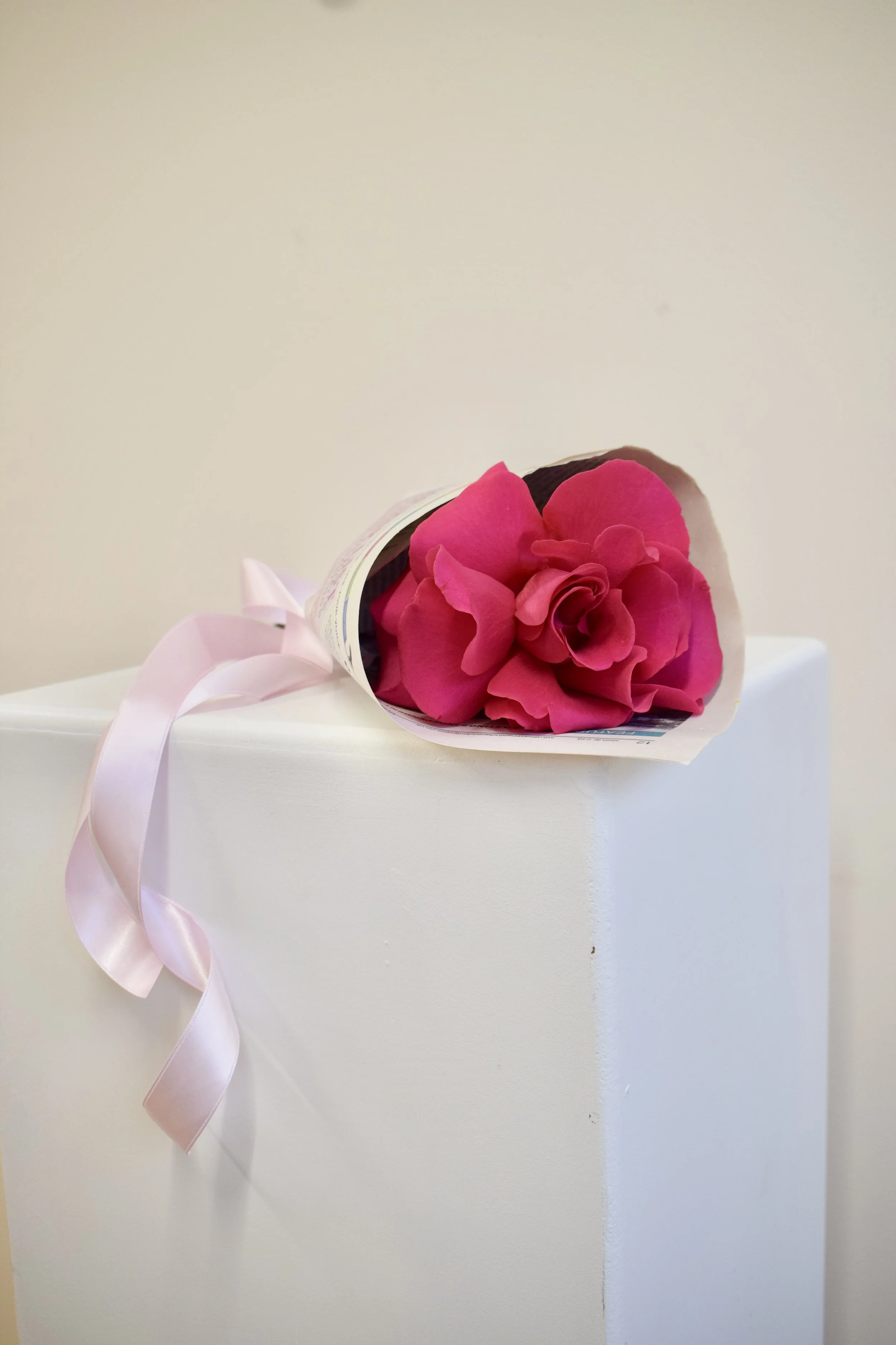 A large, hot pink reflexed rose bouquet