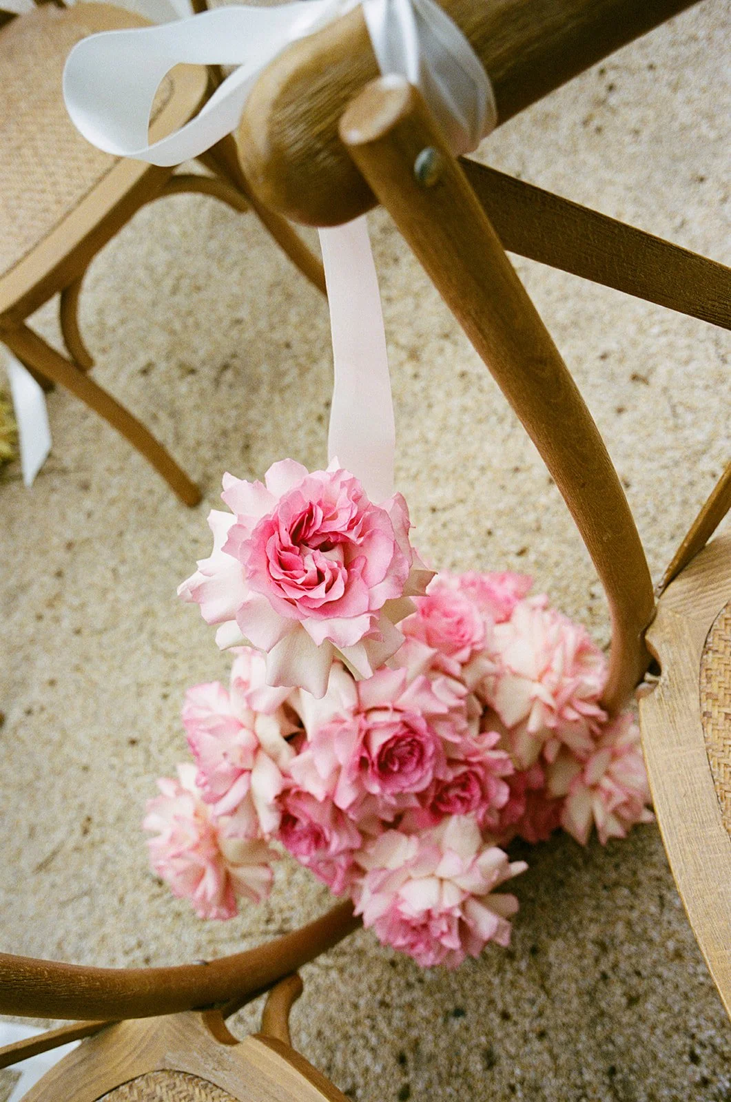 Modern pink wedding ceremony aisle flowers in London