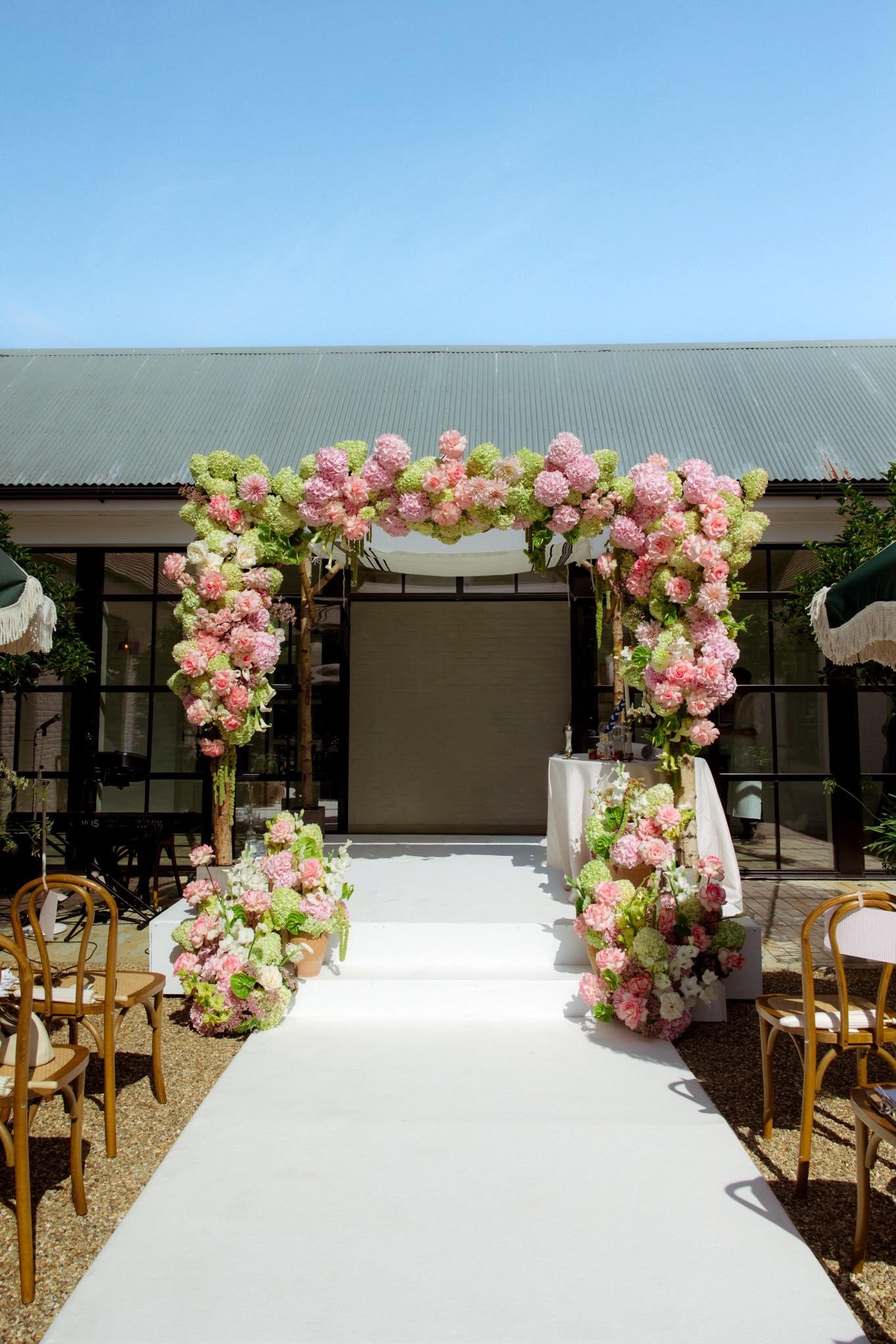 Modern chuppah florals at LIMEKILN Sussex