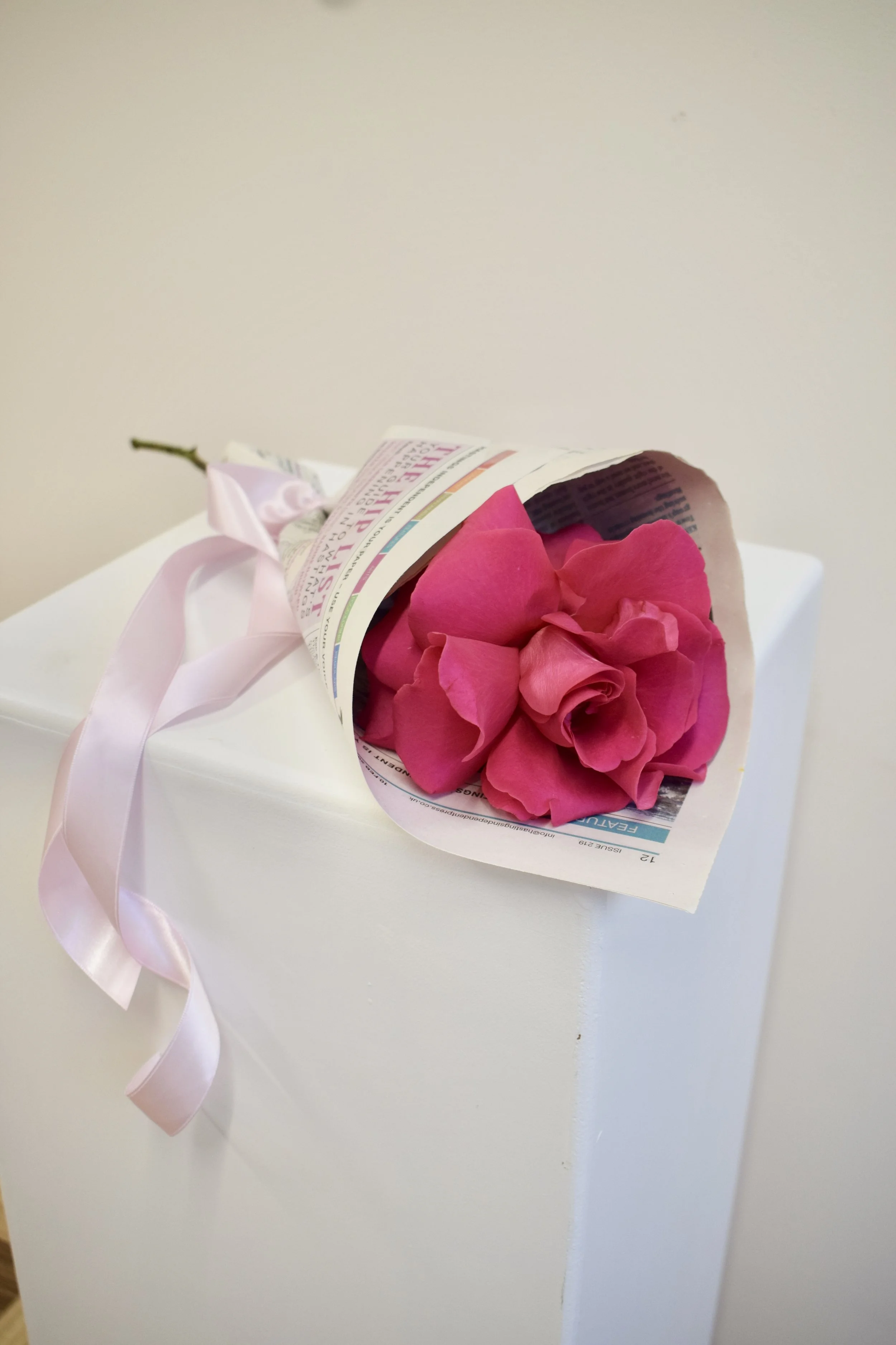 A large, hot pink reflexed rose bouquet