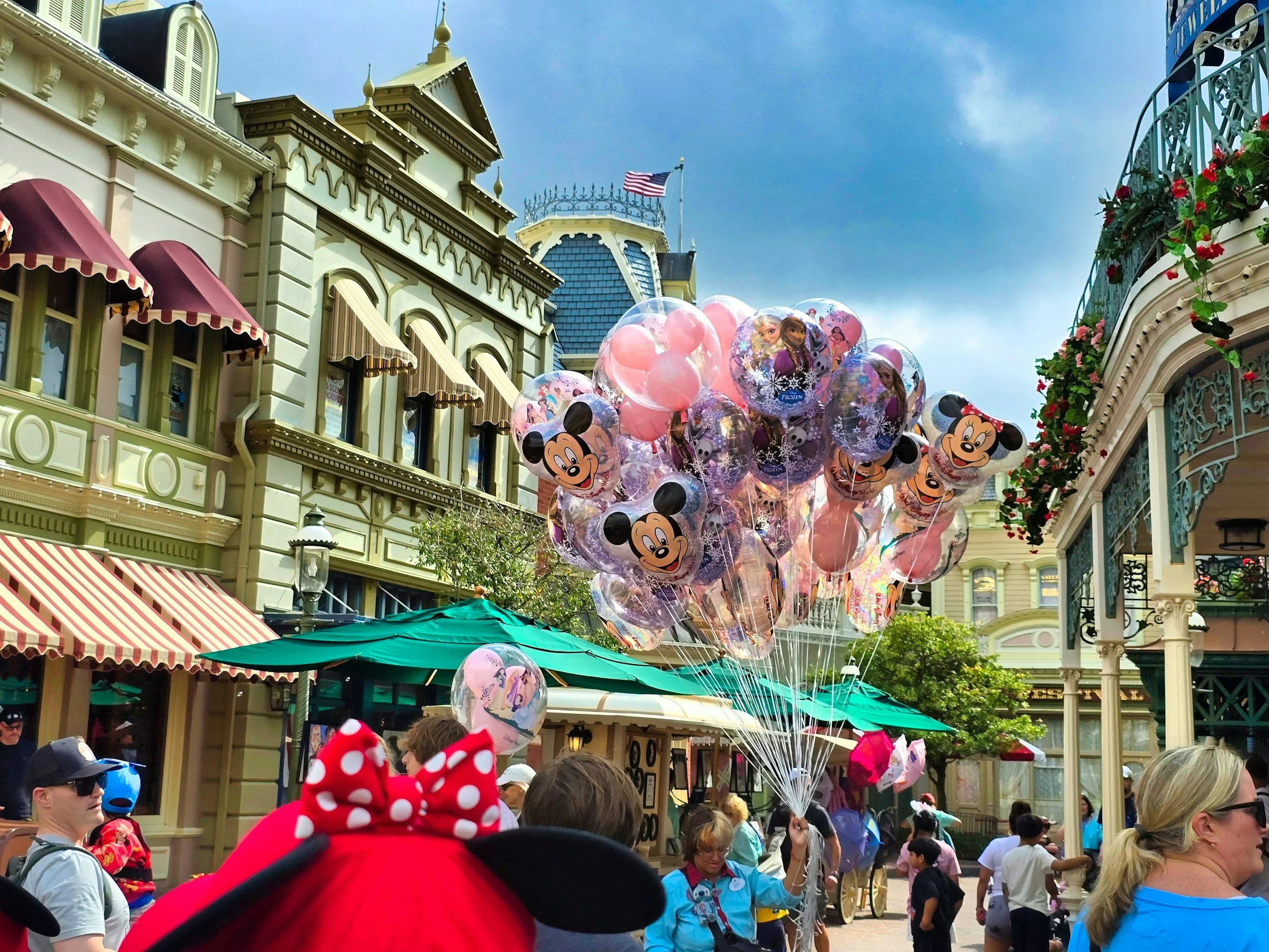 Mickey balloons on Main Street, U.S.A. at a Disney park