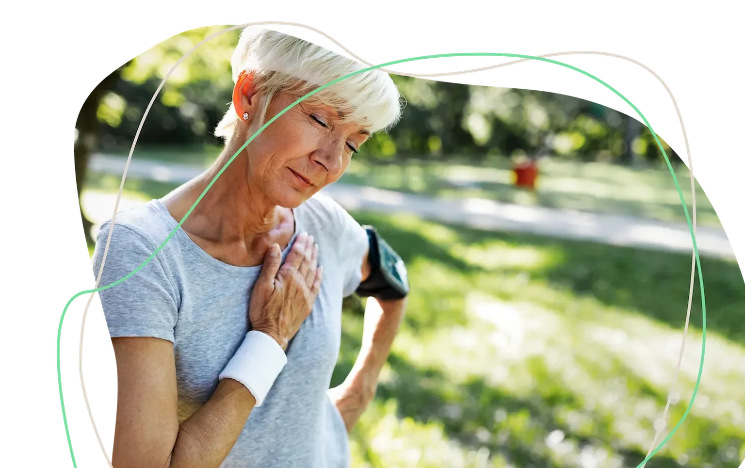 Senior woman holding chest during outdoor exercise, experiencing heart-related symptoms