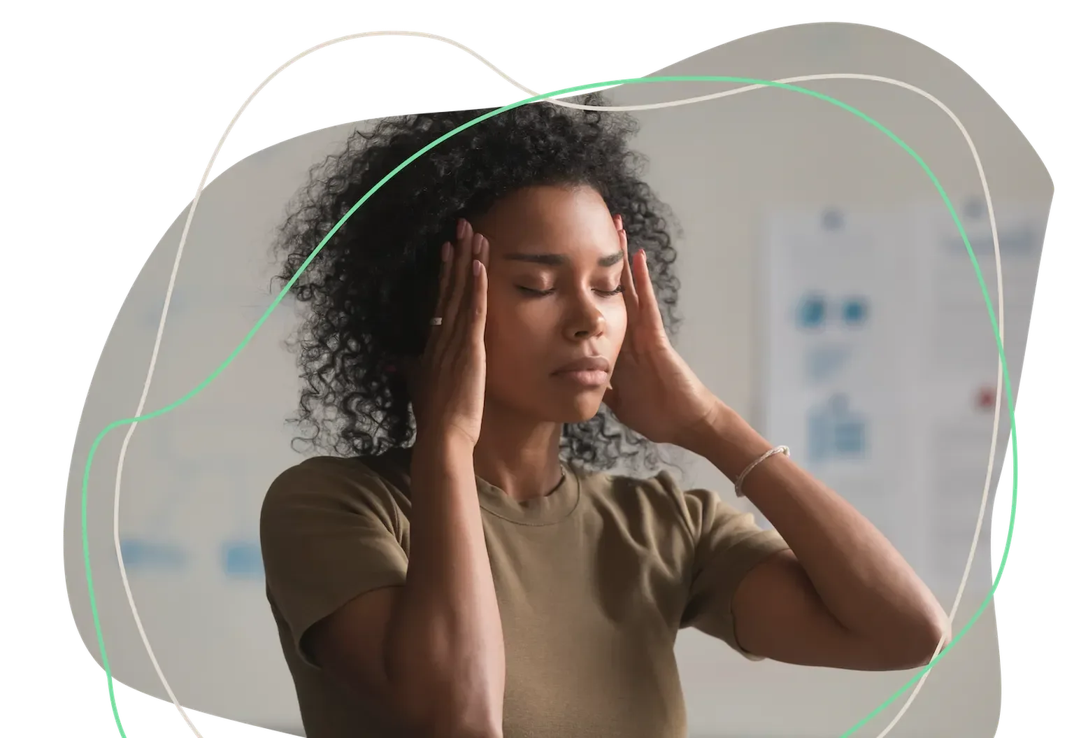 A woman with curly hair holding her head with both hands, appearing to experience stress or headache.