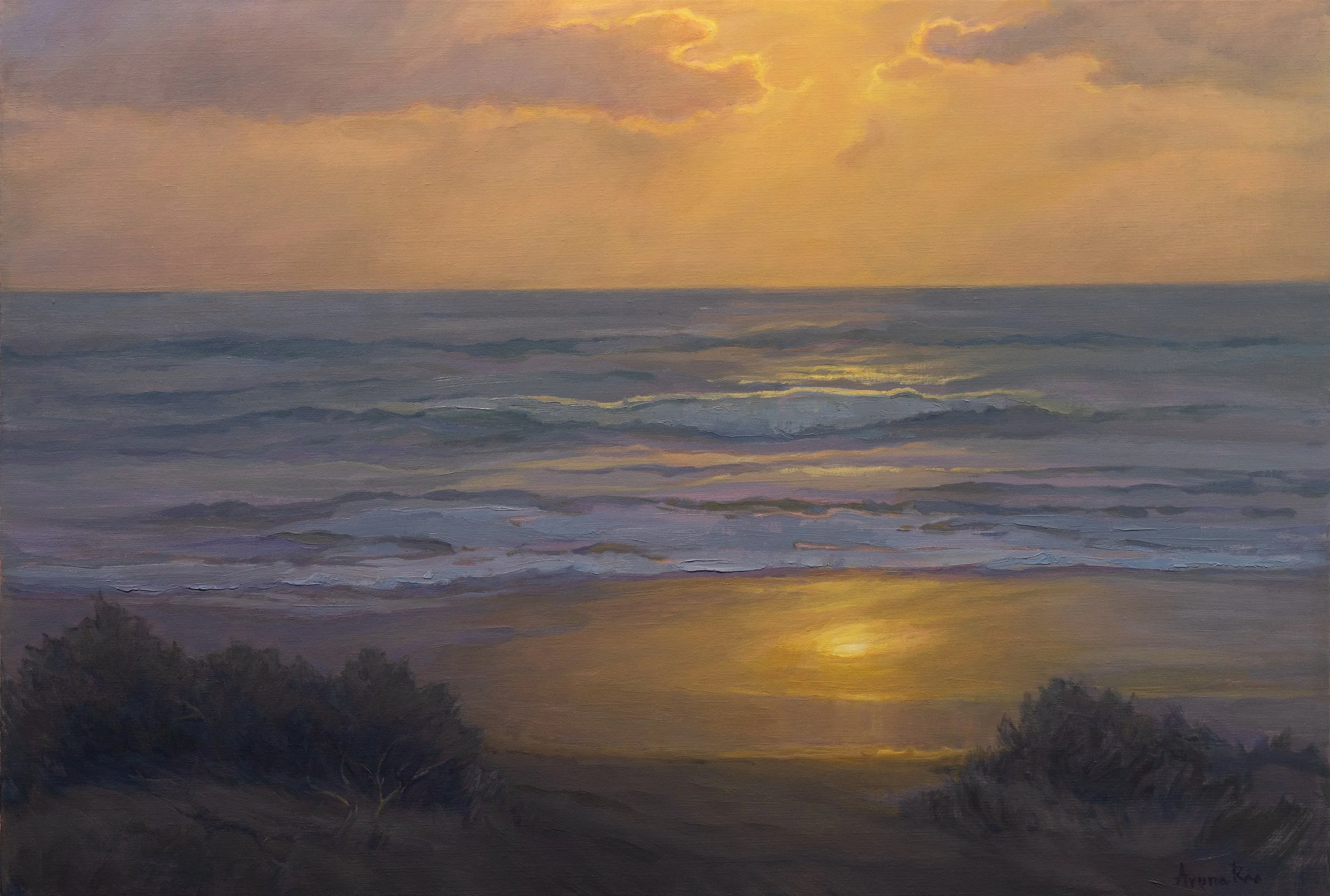 Golden light pools along the shore, shifting from broken glints across the waves into a quieter reflection on the wet sand.

A study in how light changes as it travels: diffused through warm vaporous clouds, textured and fragmented at sea, smooth and