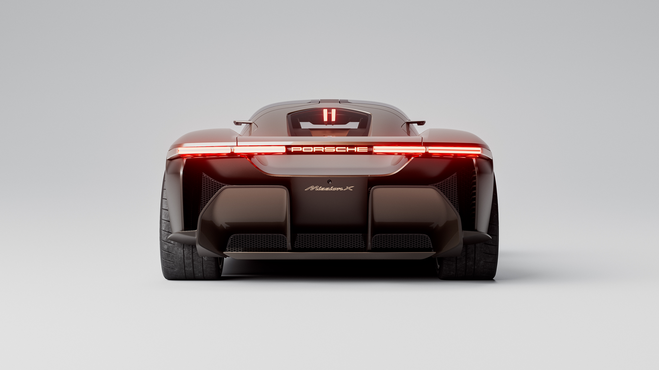 Rear CGI view of the Porsche Mission X concept, showcasing its aerodynamic lines and sculpted tail design.