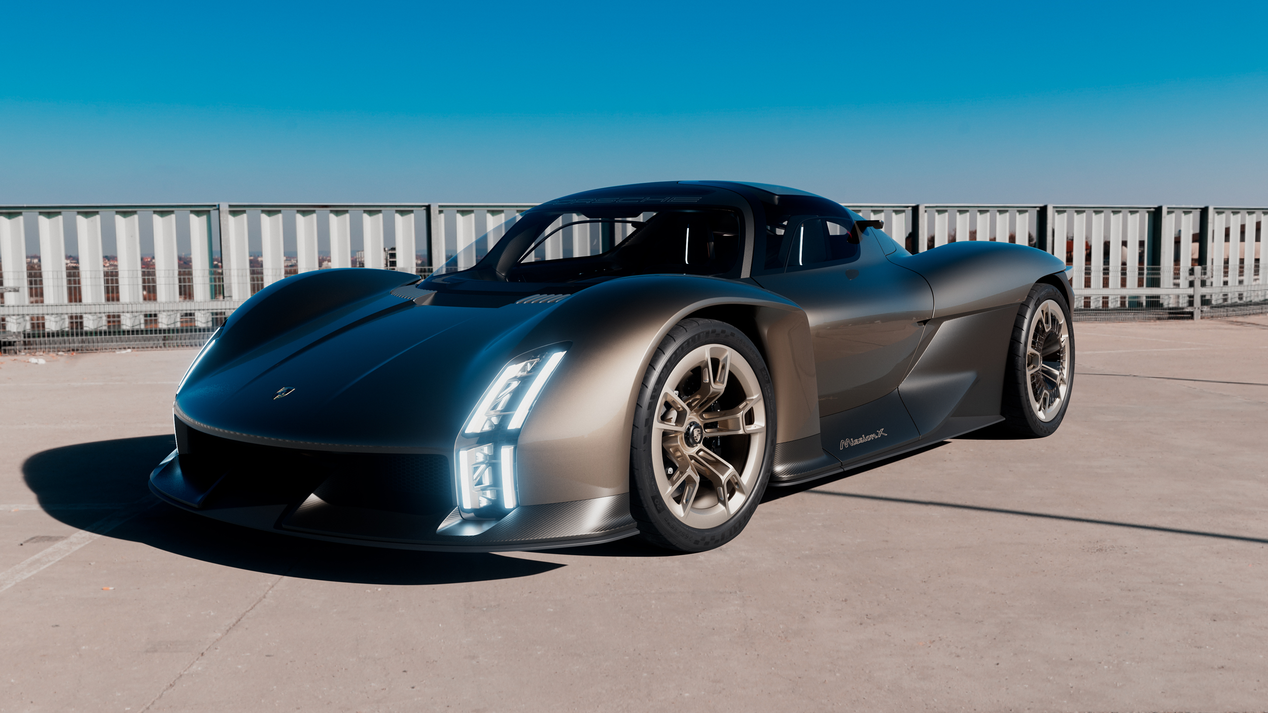 Porsche Mission X parked in an exterior environment under natural light, captured in a wide-angle CGI composition.