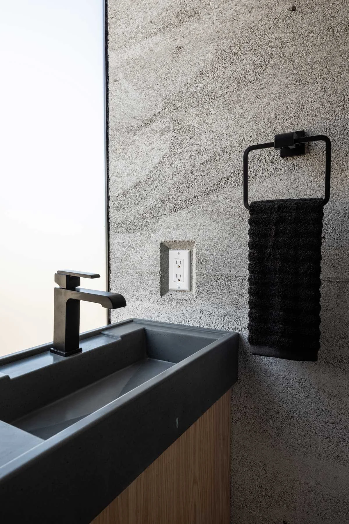 Custom artisan concrete sinks cast in Shale with turquoise inlays. Made in the USA from UHPC concrete and finished with non-toxic, food-safe sealers for safe living.