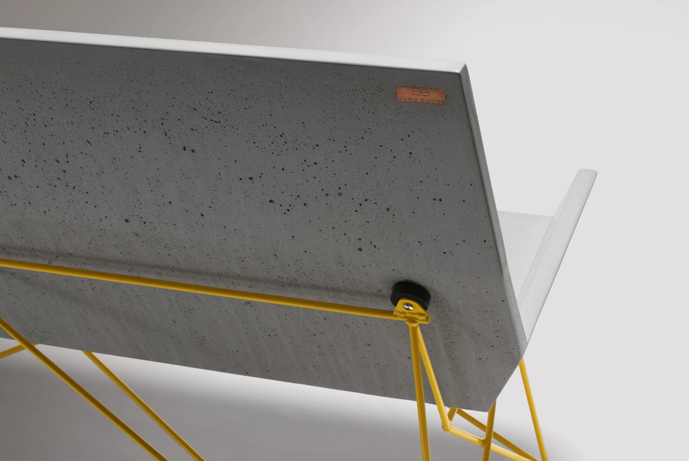 Inclinaire Bench blending modern concrete with timeless steel craftsmanship