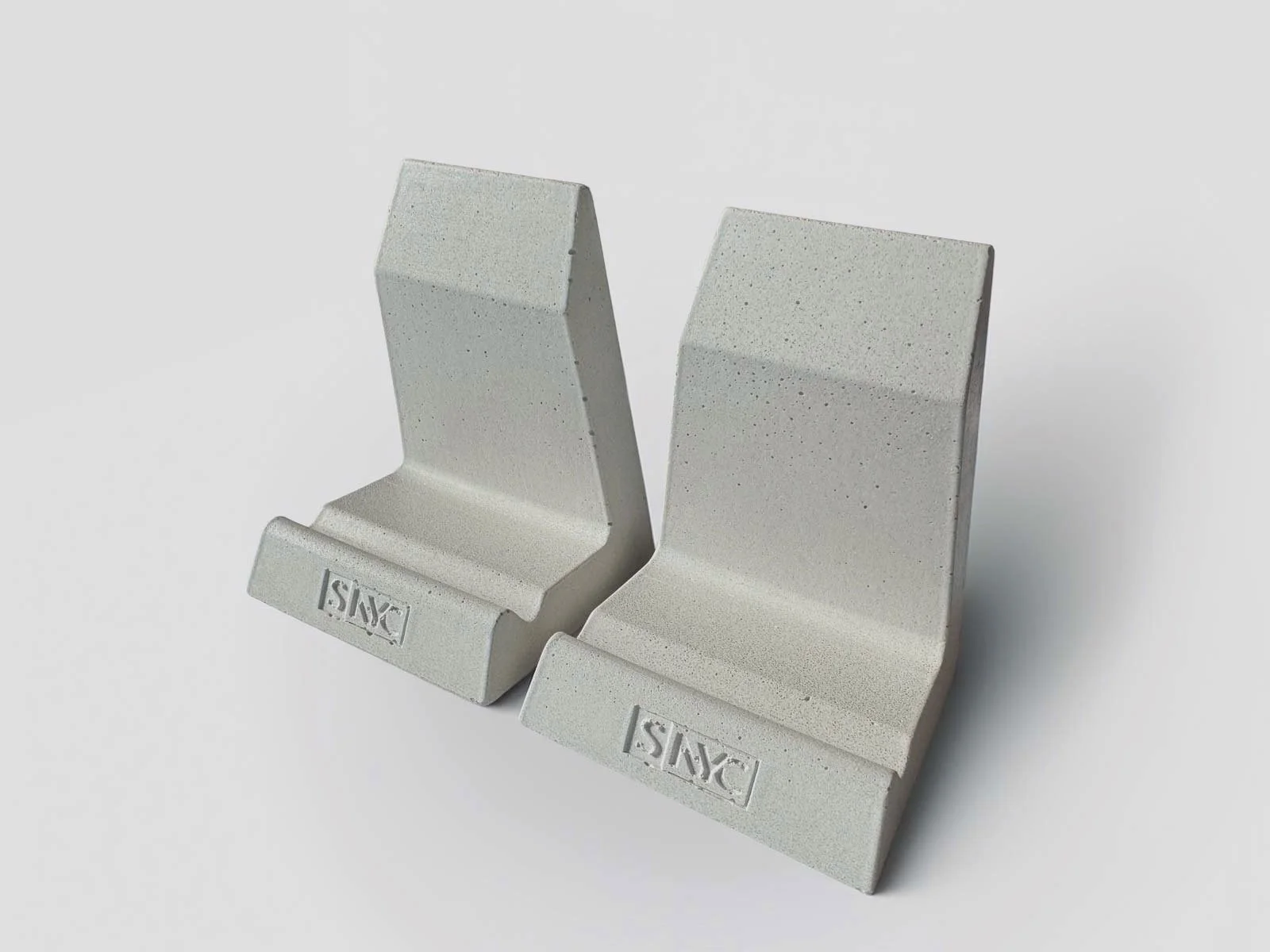 Handcrafted white concrete phone stand used as branded corporate Christmas gift