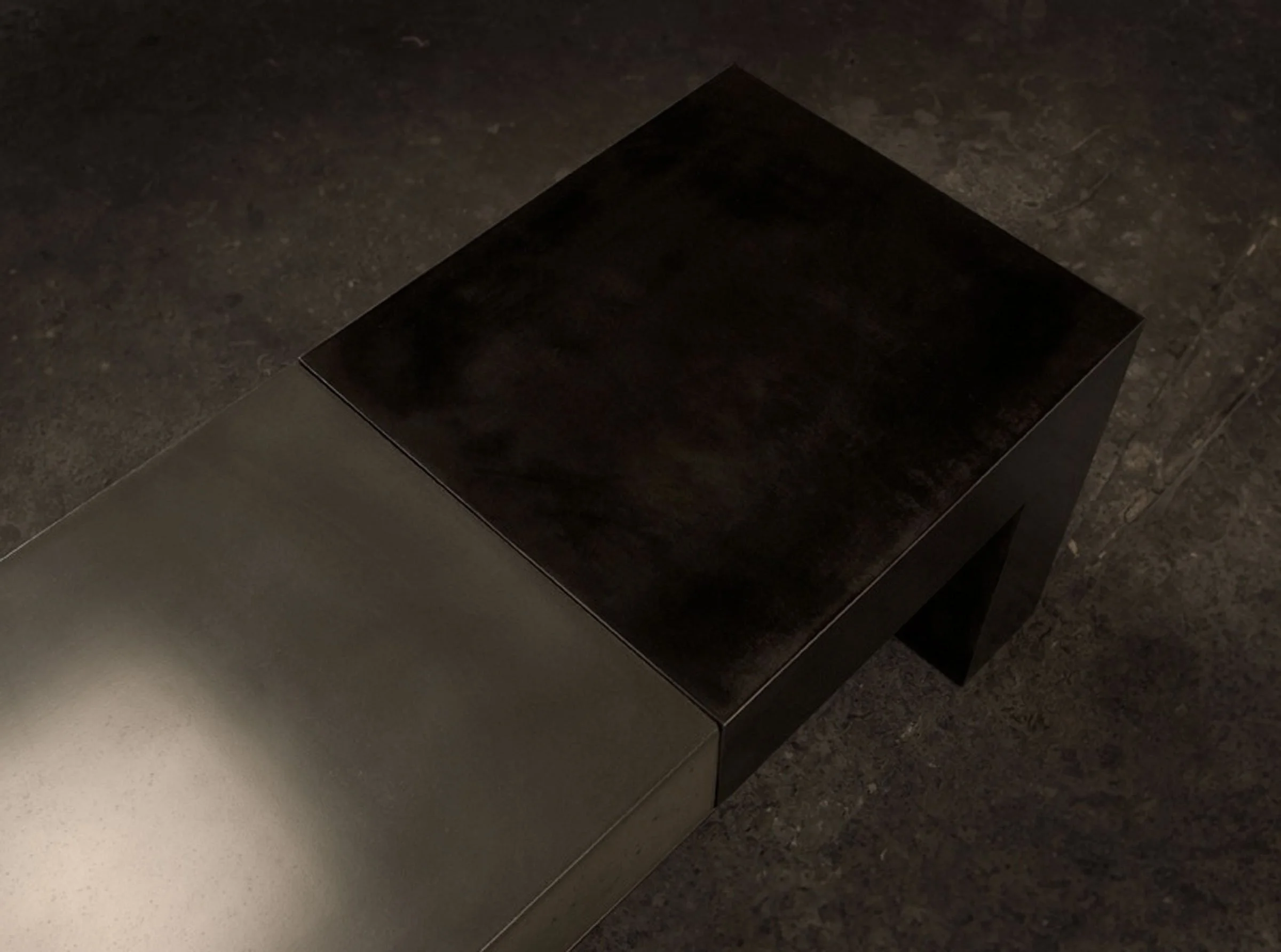 Modern concrete and steel bench handcrafted for residential use