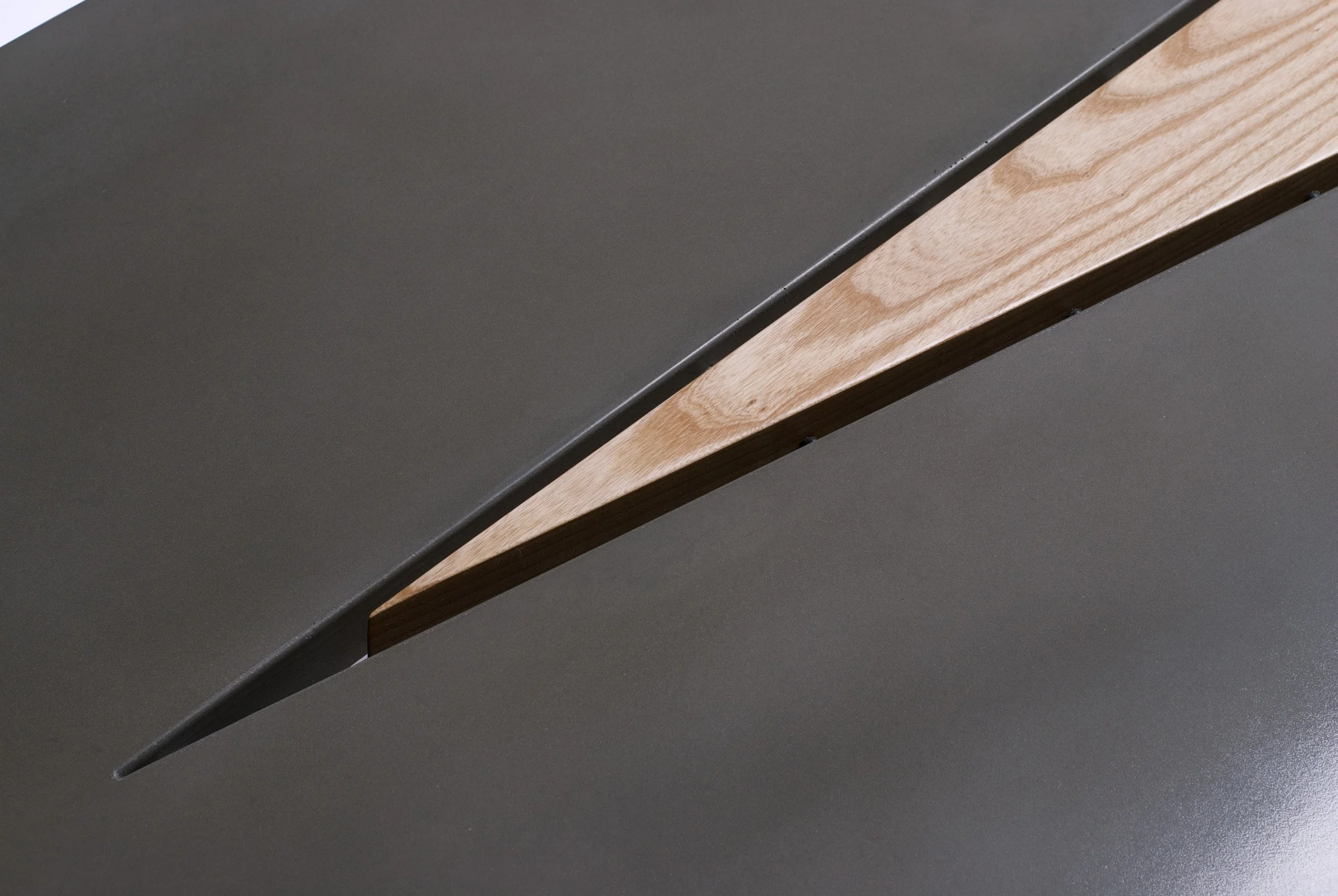 Communal dining table with wood centerpiece designed for serving and décor