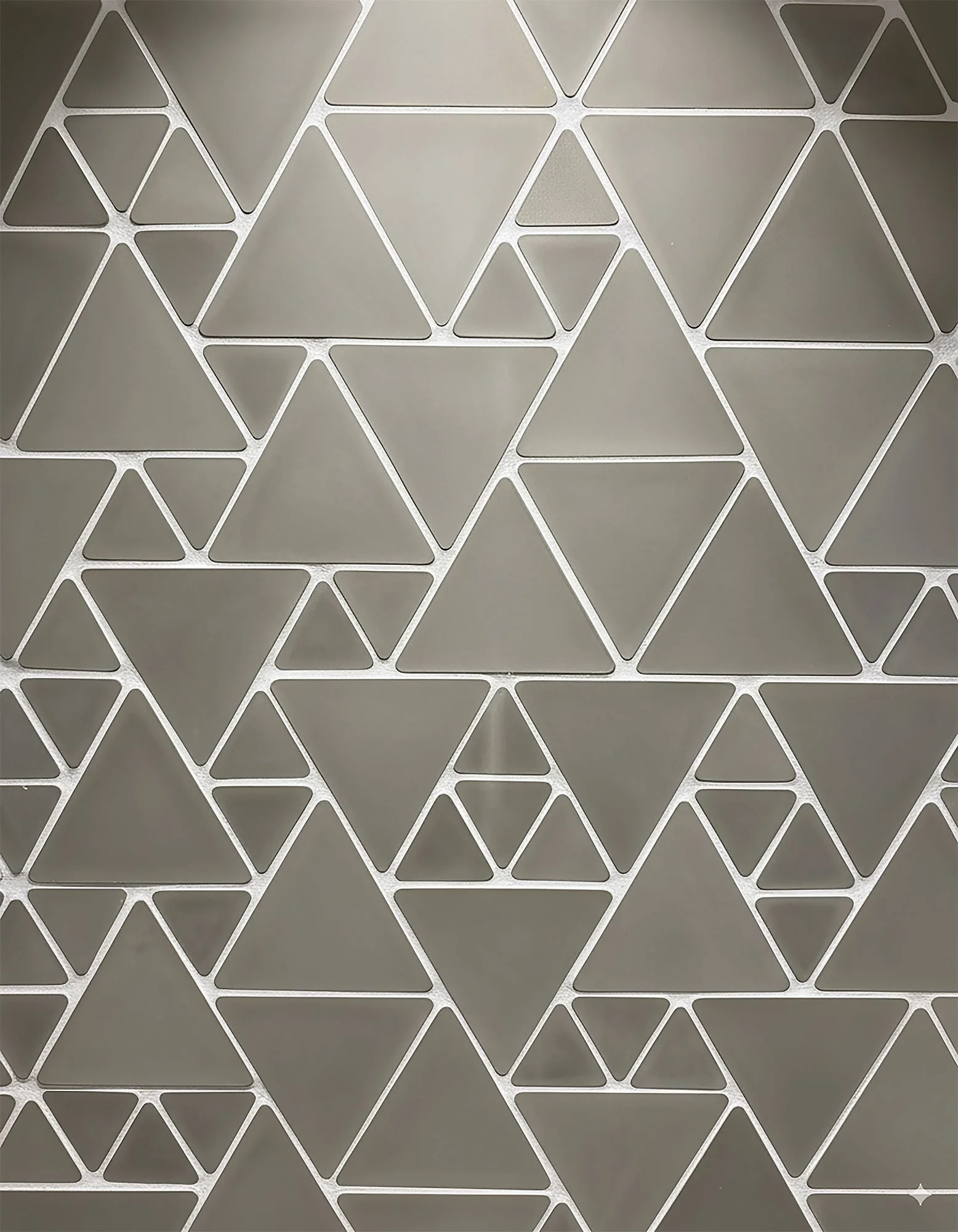Stream of Consciousness triangular concrete tile for floors and walls