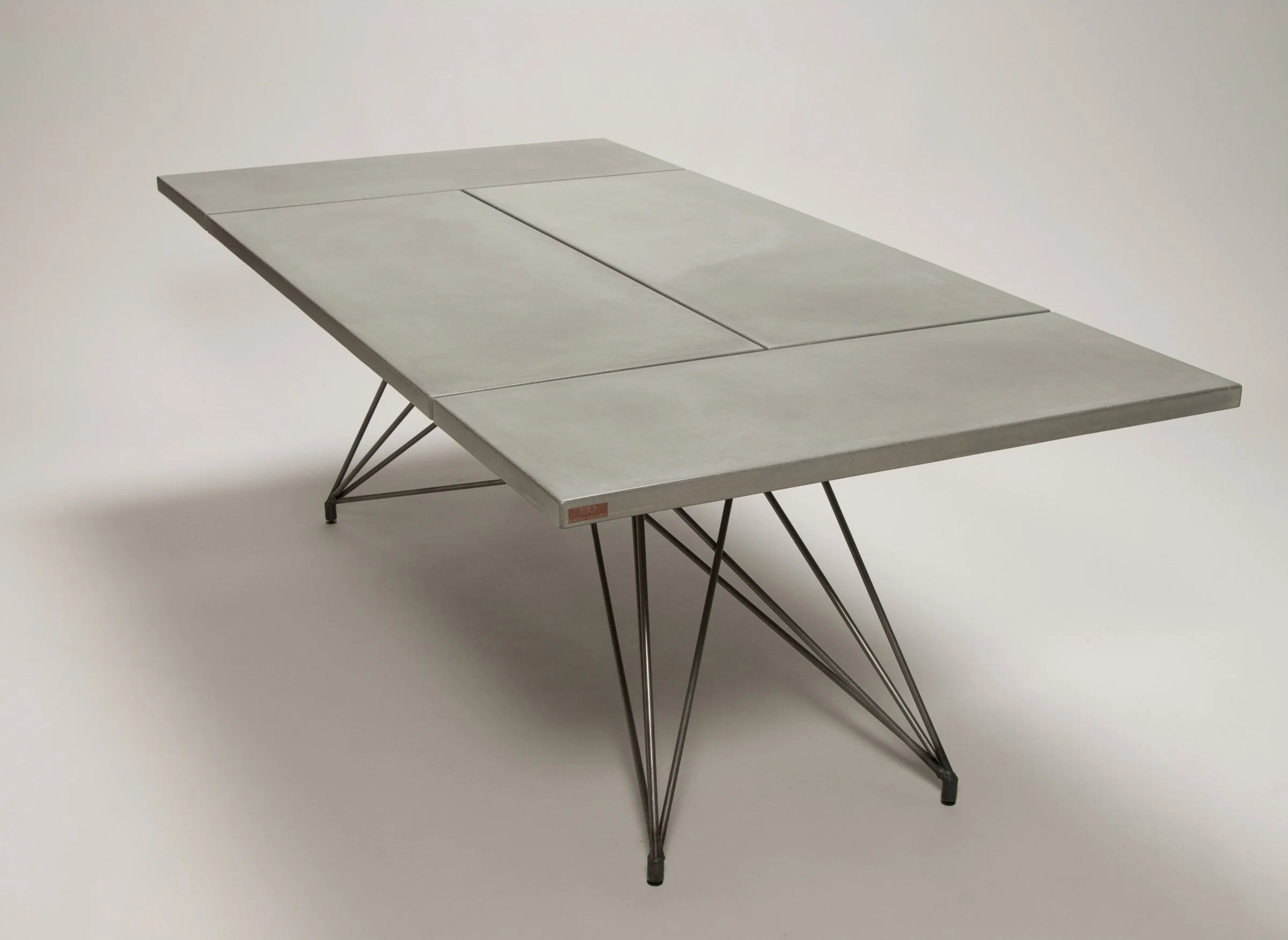 VOC-free sealed concrete dining table designed for heavy café use