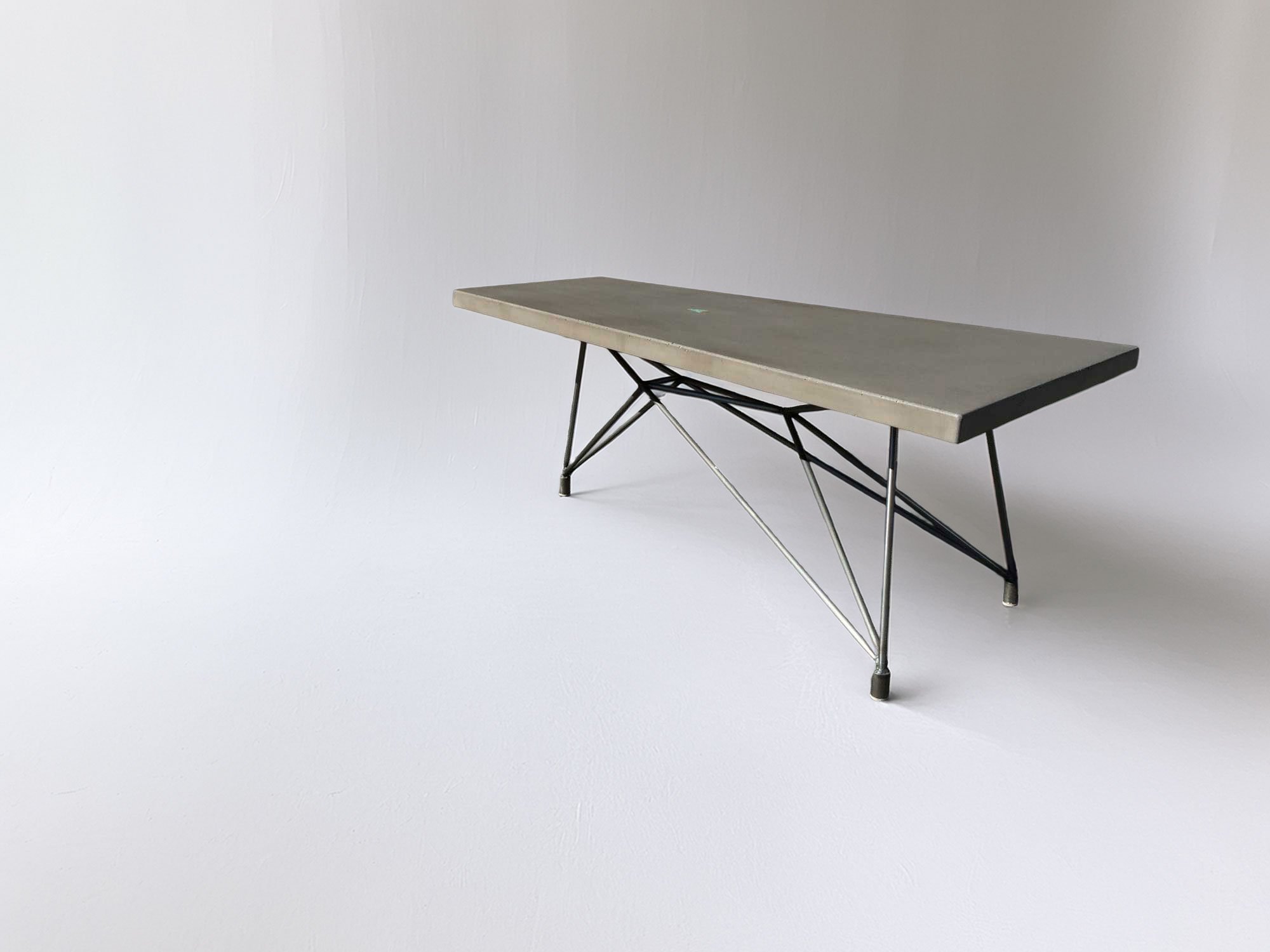 A concrete and steel coffee table, modern in design