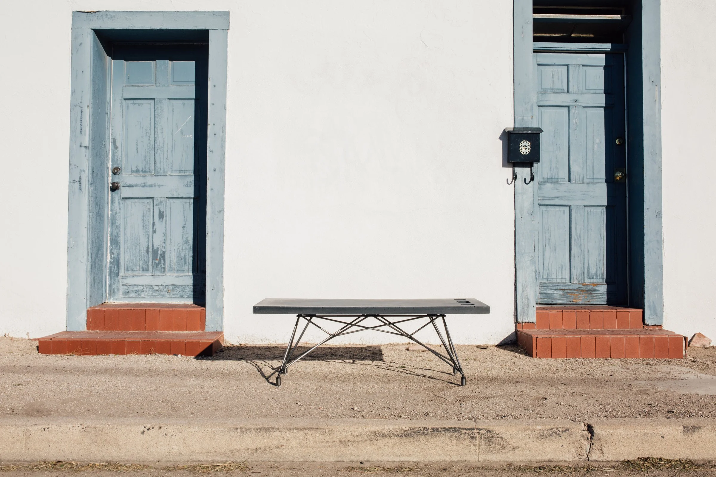 Coffee shop concrete table with chalkboard surface for creative use