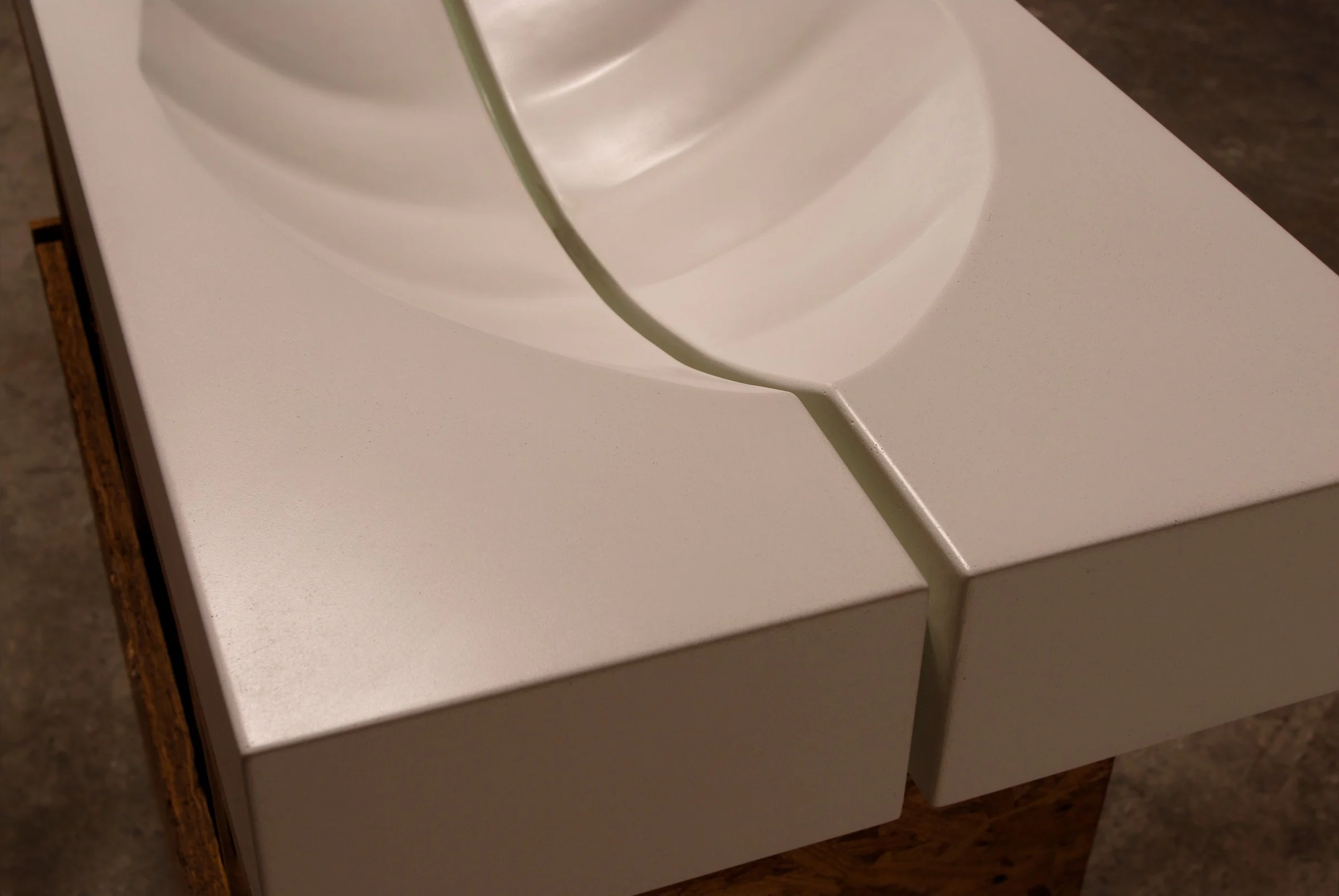 Handcrafted UHPC concrete sink reimagined from vintage Palm design.