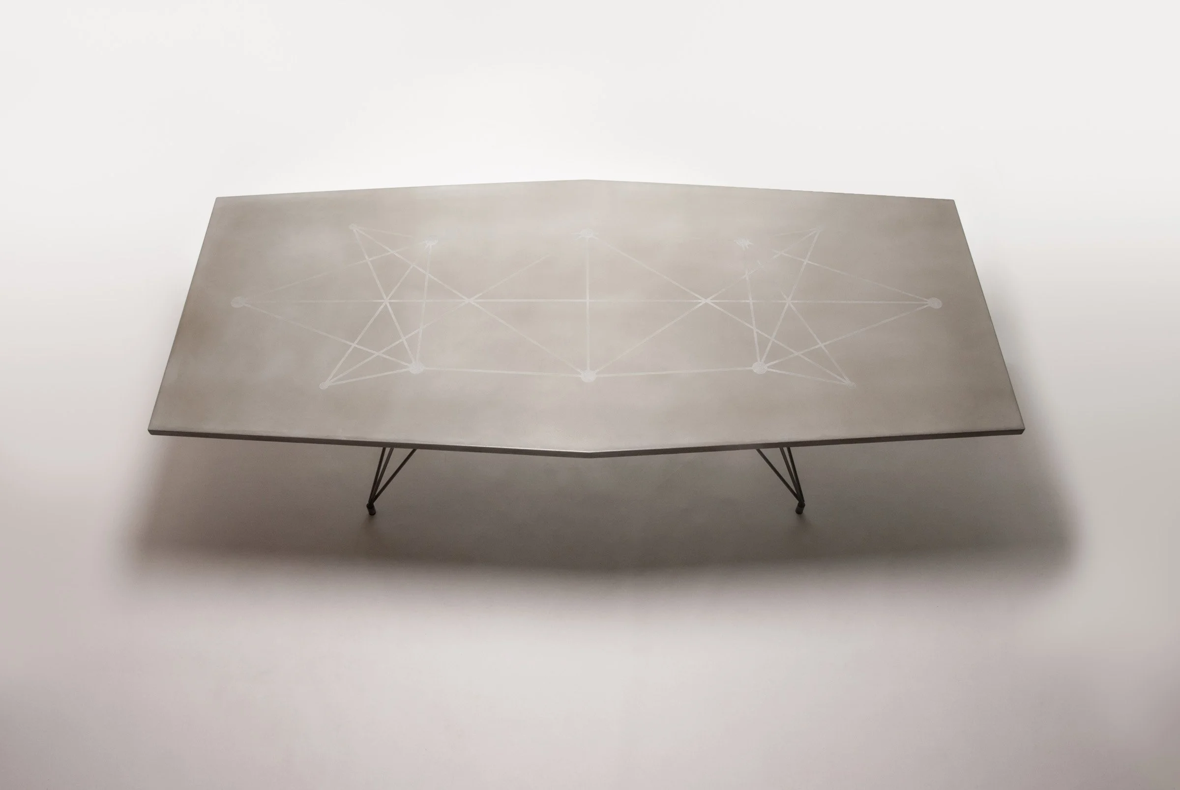 Handcrafted GFRC concrete tabletop with subtle etched geometric design