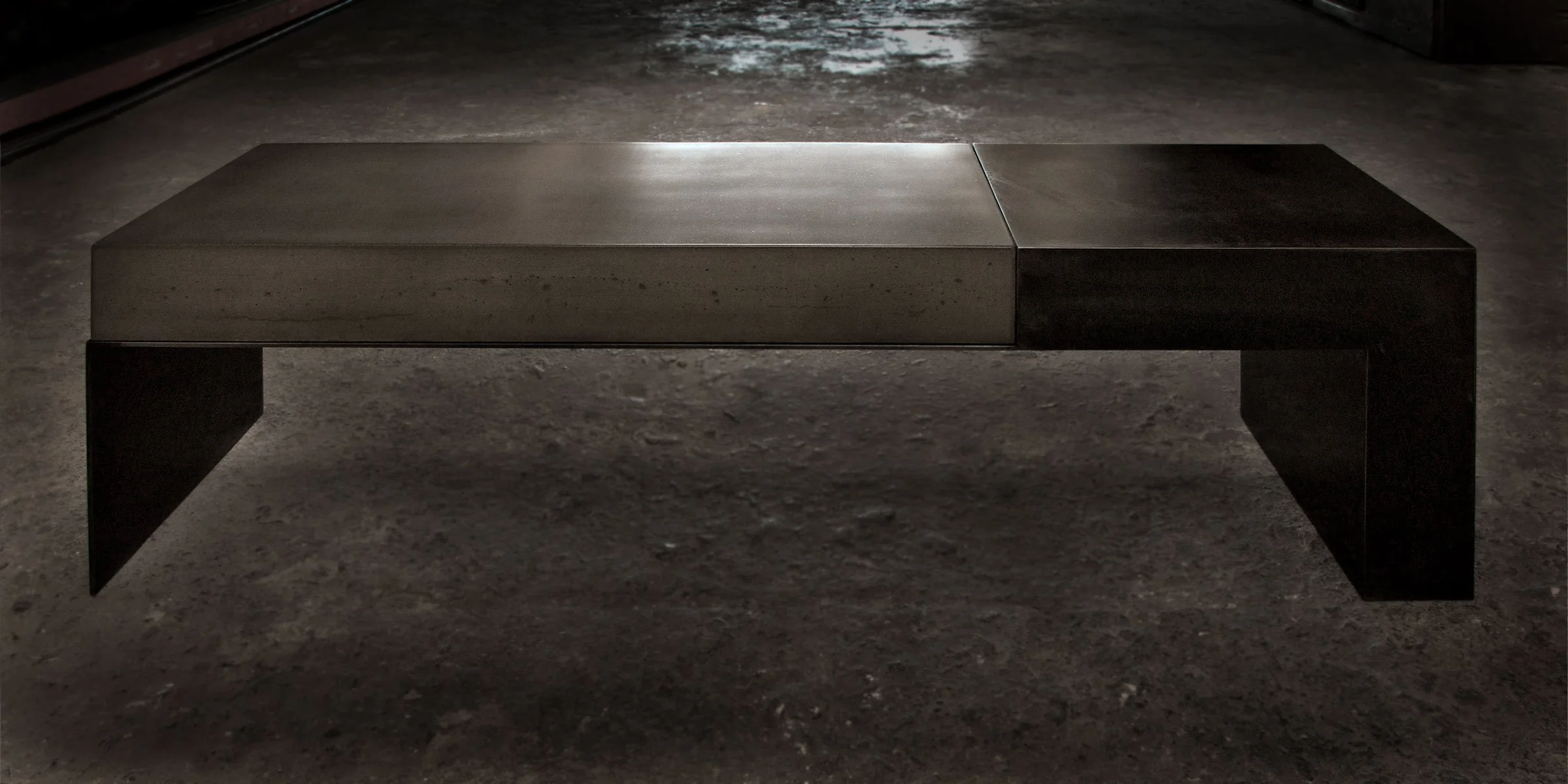 Handcrafted entry bench in concrete and steel. A modern design built for everyday use and lasting durability - furniture that wears in, not out.