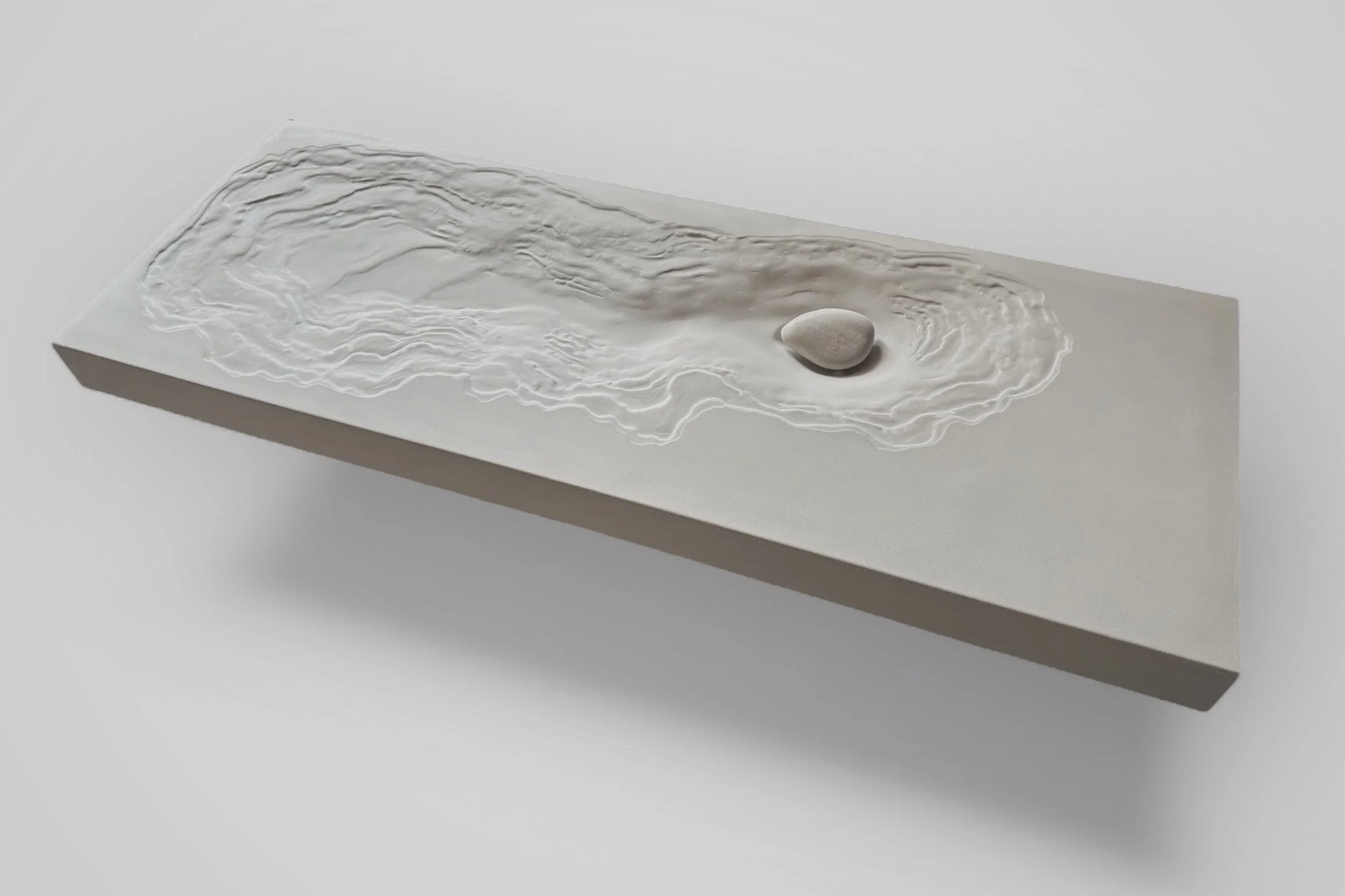 Luxury erosion-style bathroom sink with hidden stone drain design. Crafted in GFRC using crystalline silica-free concrete and sealed with a durable, non-toxic sealer.