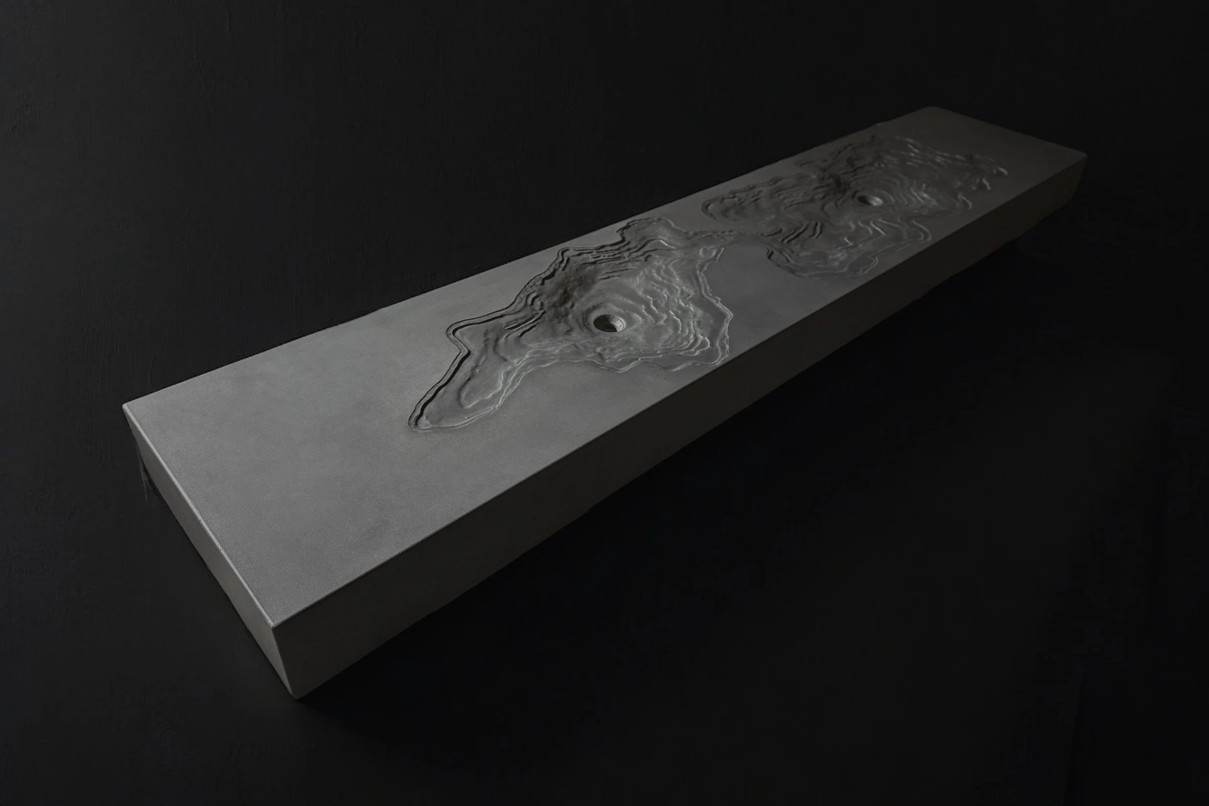 Custom luxury bathroom sink design with two basins, made from silica-free concrete.