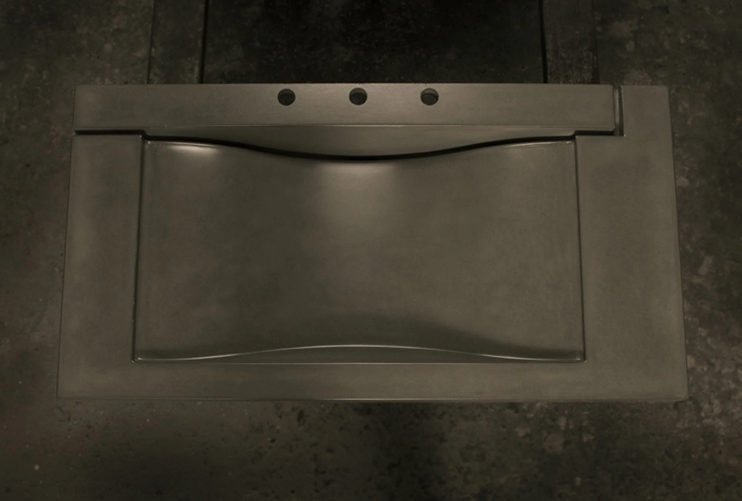 Hard Goods Remix Sink featuring a GFRC wave basin with custom side slot drain. Handcrafted in the USA from crystalline silica-free concrete for modern durability.