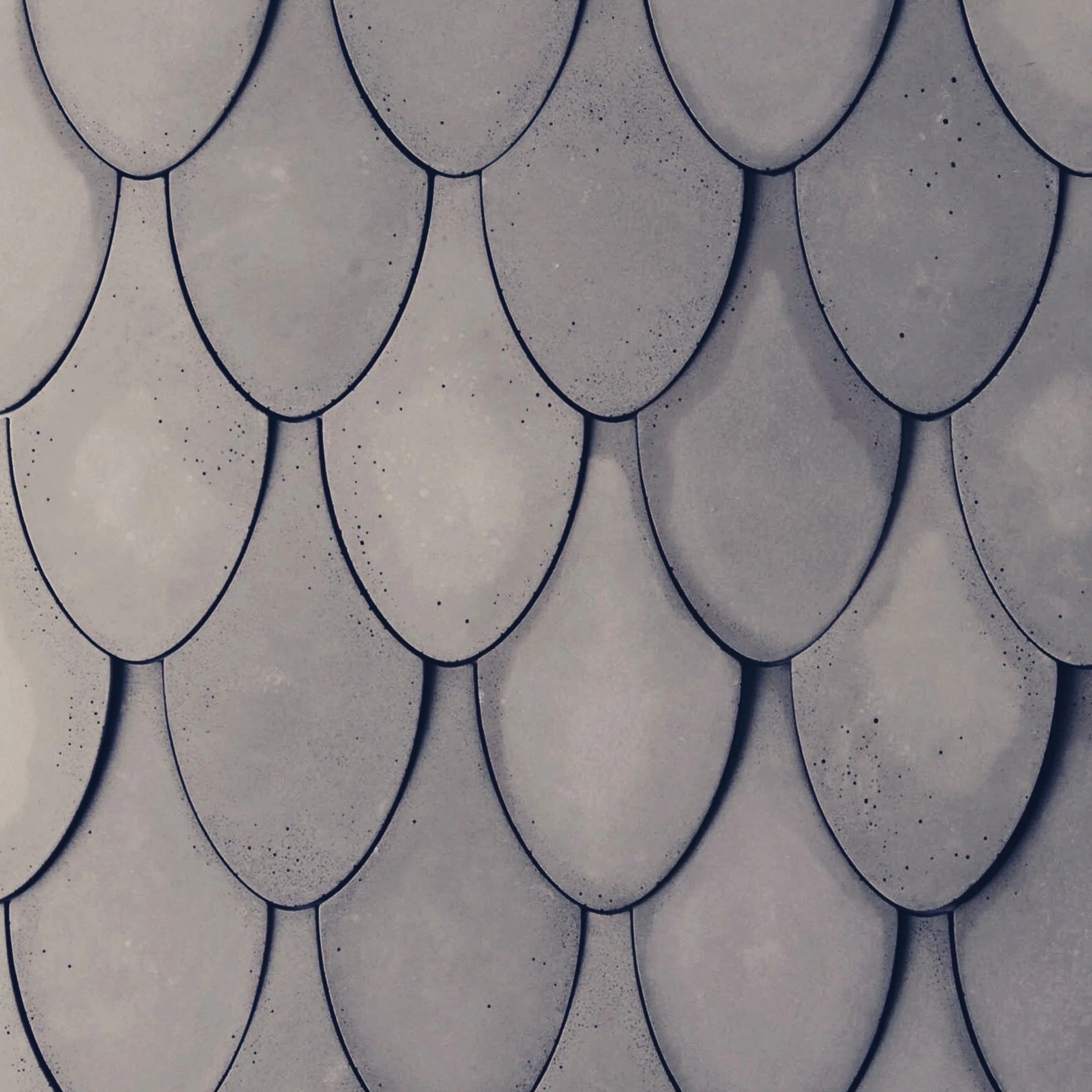 Silver Fin scalloped concrete tile with 3D fish-scale design