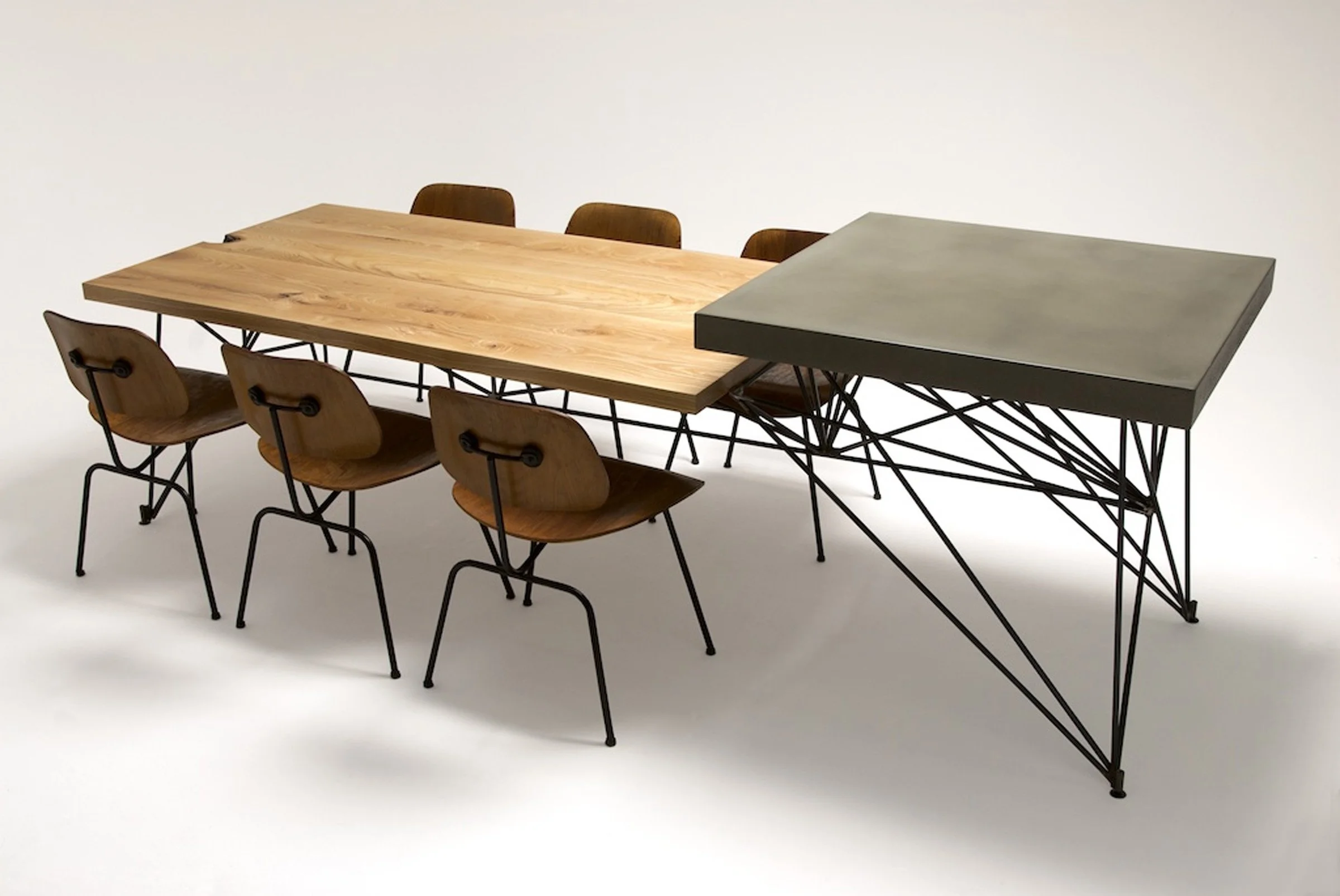 Multifunctional dining table with concrete prep surface and seating for six