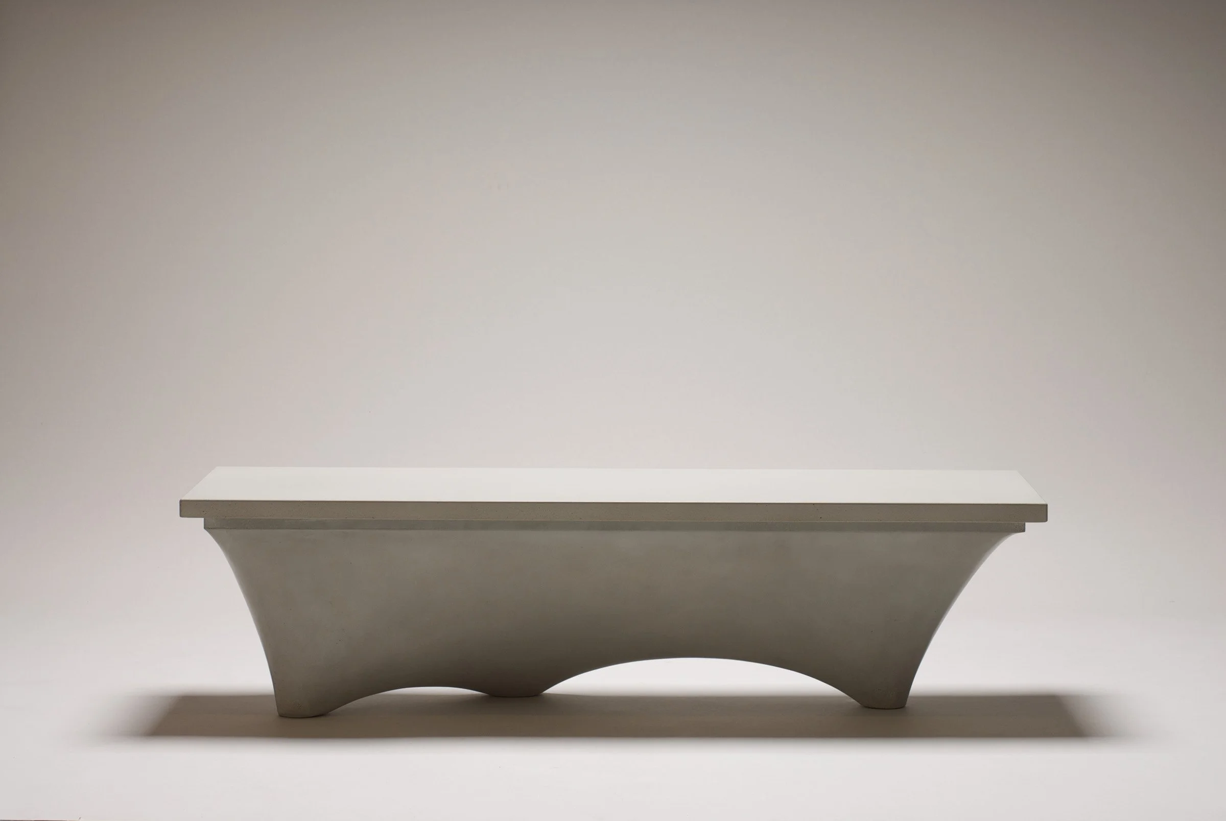 Artisan concrete bench showing fabric-formed textures and details