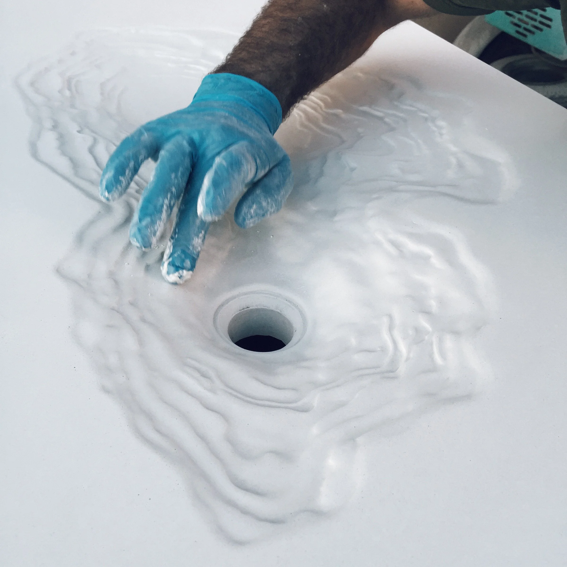 Handcrafting a custom white concrete Erosion Sink
