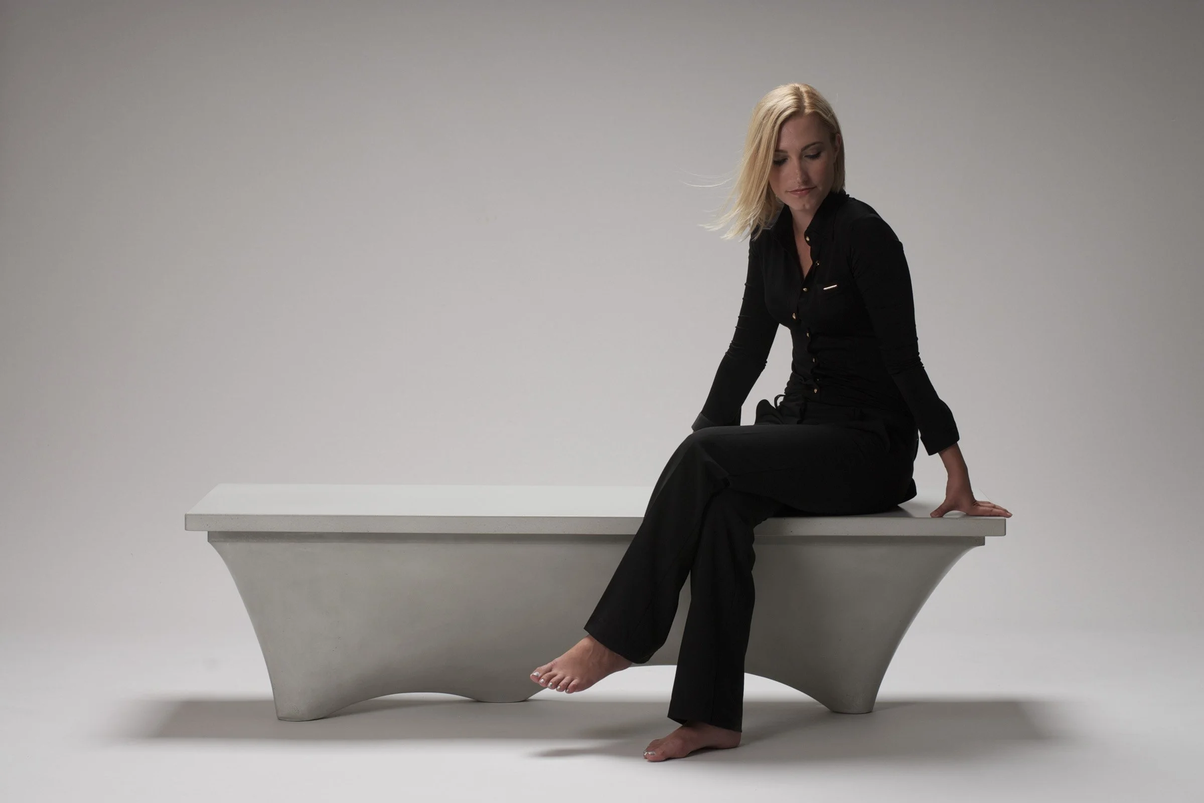 Fabric-formed concrete furniture showing innovative sculptural form
